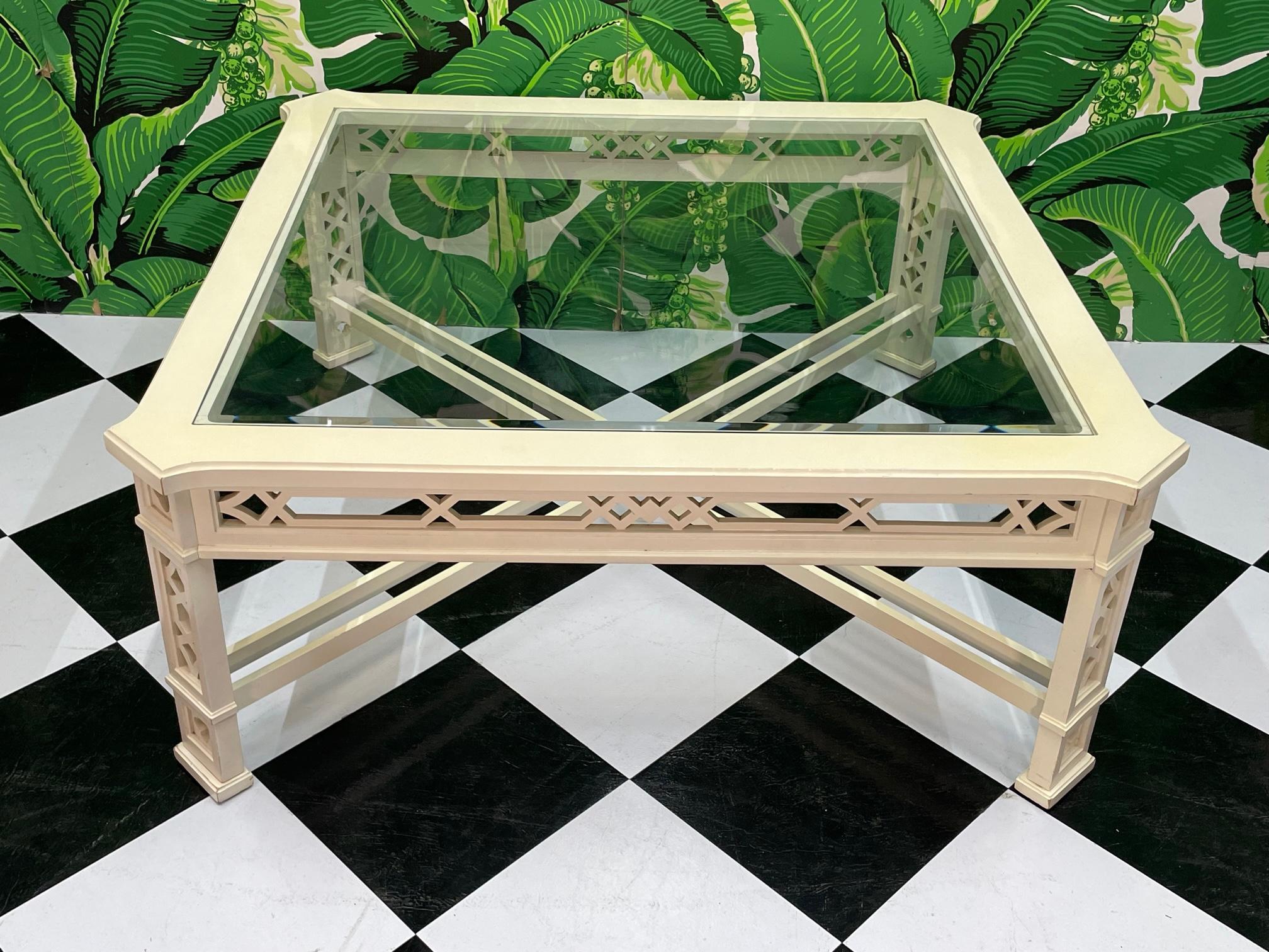 Vintage coffee/cocktail table by Thomasville features ornate modern fretwork, double X stretchers, and a glass top. Good condition with minor imperfections consistent with age, see photos for condition details.
For a shipping quote to your exact zip