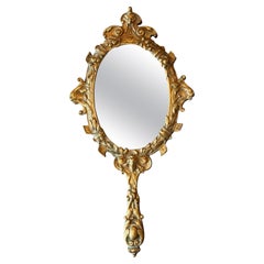 Ornate Cast Brass Hand Mirror With Figural Motifs