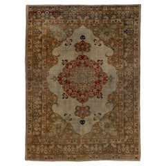 Verzierter zentraler Medaillon-Tabriz-Teppich aus rostfarbenem Olivenholz mit königsroten Akzenten