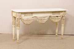 Ornate Console Table with Heavily-Swagged Skirt and Travertine Top
