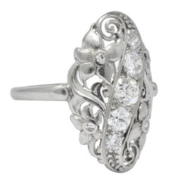 Ornate Edwardian 0.80 Carat Diamond Platinum Floral Dinner Ring, circa 1915