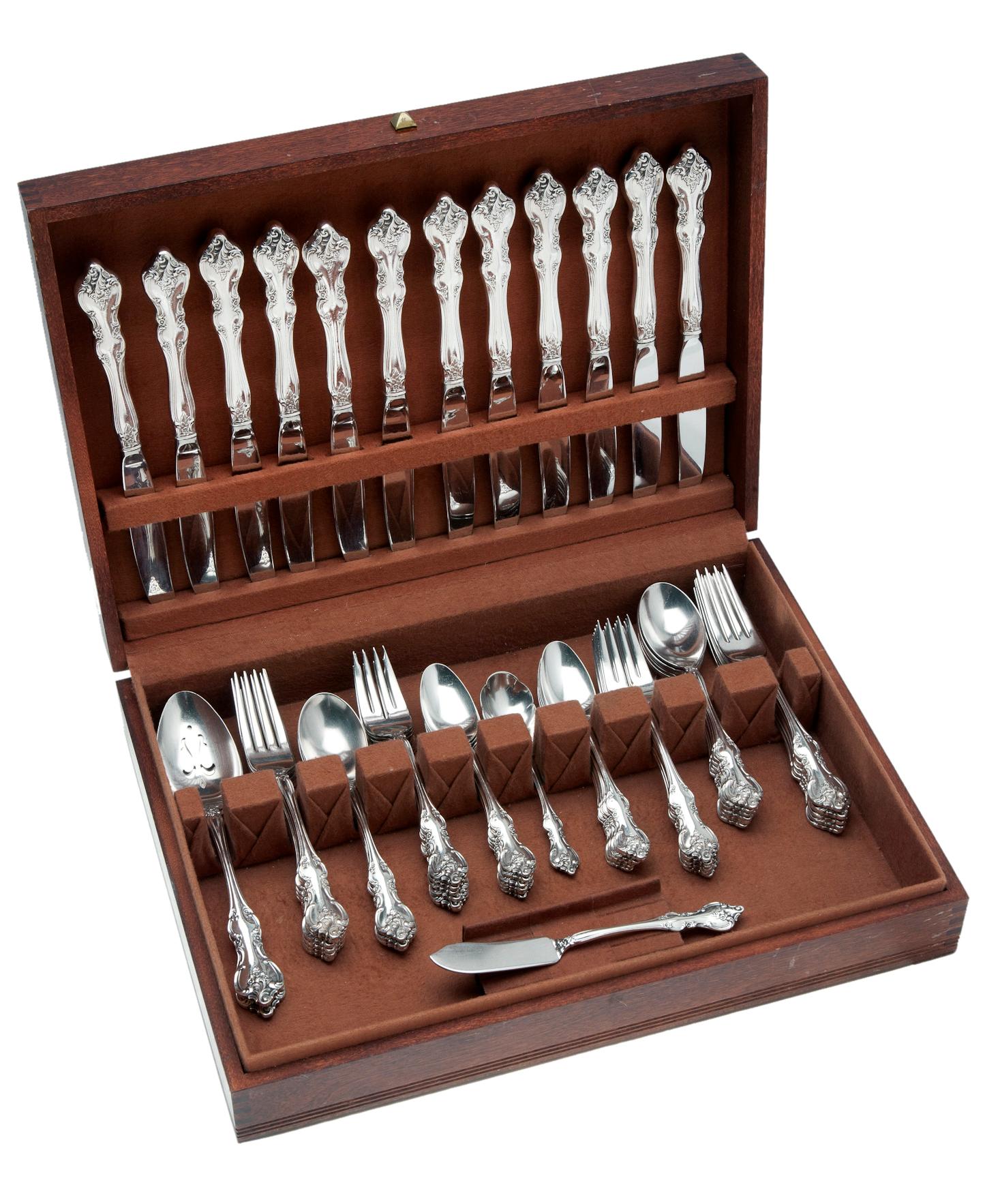 Machine-Made Ornate Flatware Complete Service for 12; and 6 additional place settings