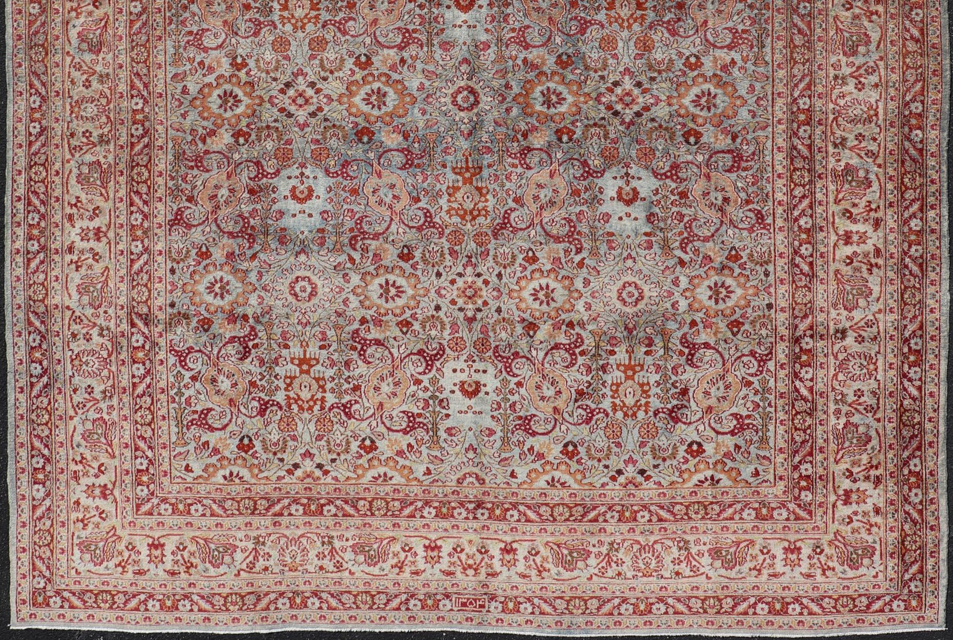 Ornate floral pattern Khorassan antique Persian rug in burgundy and grey, Keivan Woven Arts / rug EMA-7514, country of origin / type: Iran / Khorassan, circa 1920.

This spectacular antique Persian Khorasan carpet from early 20th century Iran bears
