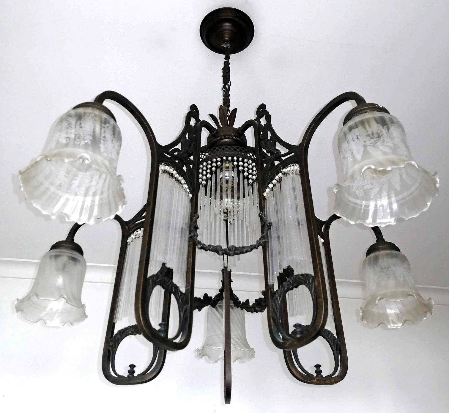 Ornate French Art Nouveau and Art Deco, frosted satin etched art glass lamp shades chandelier
Measures: 
Diameter 30.7 in/ 78 cm
Height 32.2 in / 82 cm
Weight 7 Kg / 32 lb
6-light bulbs (5-E14 + 1 E.27) Good working condition
Assembly required.