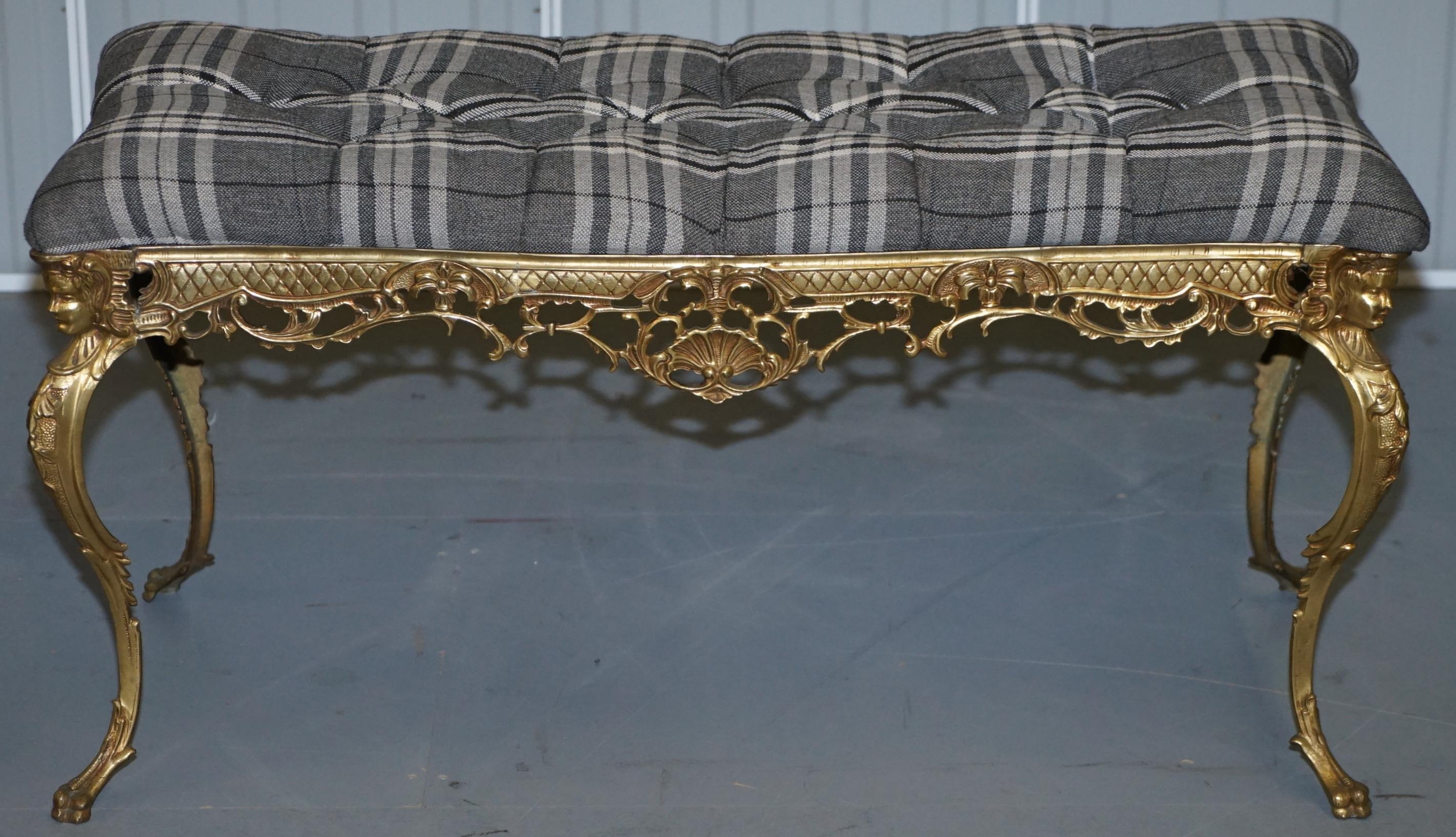 We are delighted to offer for sale this lovely original circa 1920s French gold gilt brass bench stool with new chesterfield tufted tartan upholstery

A very ornately cast traditional French neoclassical revival bench. Stamped on the inside of the