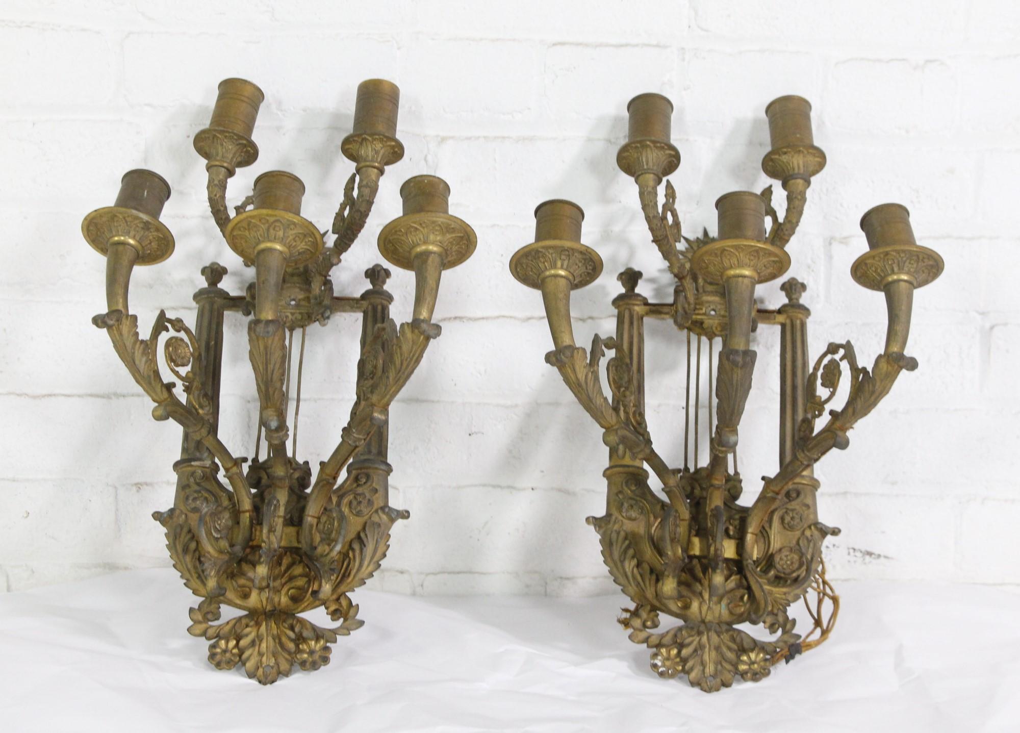 Pair of 19th Century French ornate cast bronze sconces. Featuring five arms each with over the top intricate detail. Shown here as is. Price includes restoration. Priced as a pair.