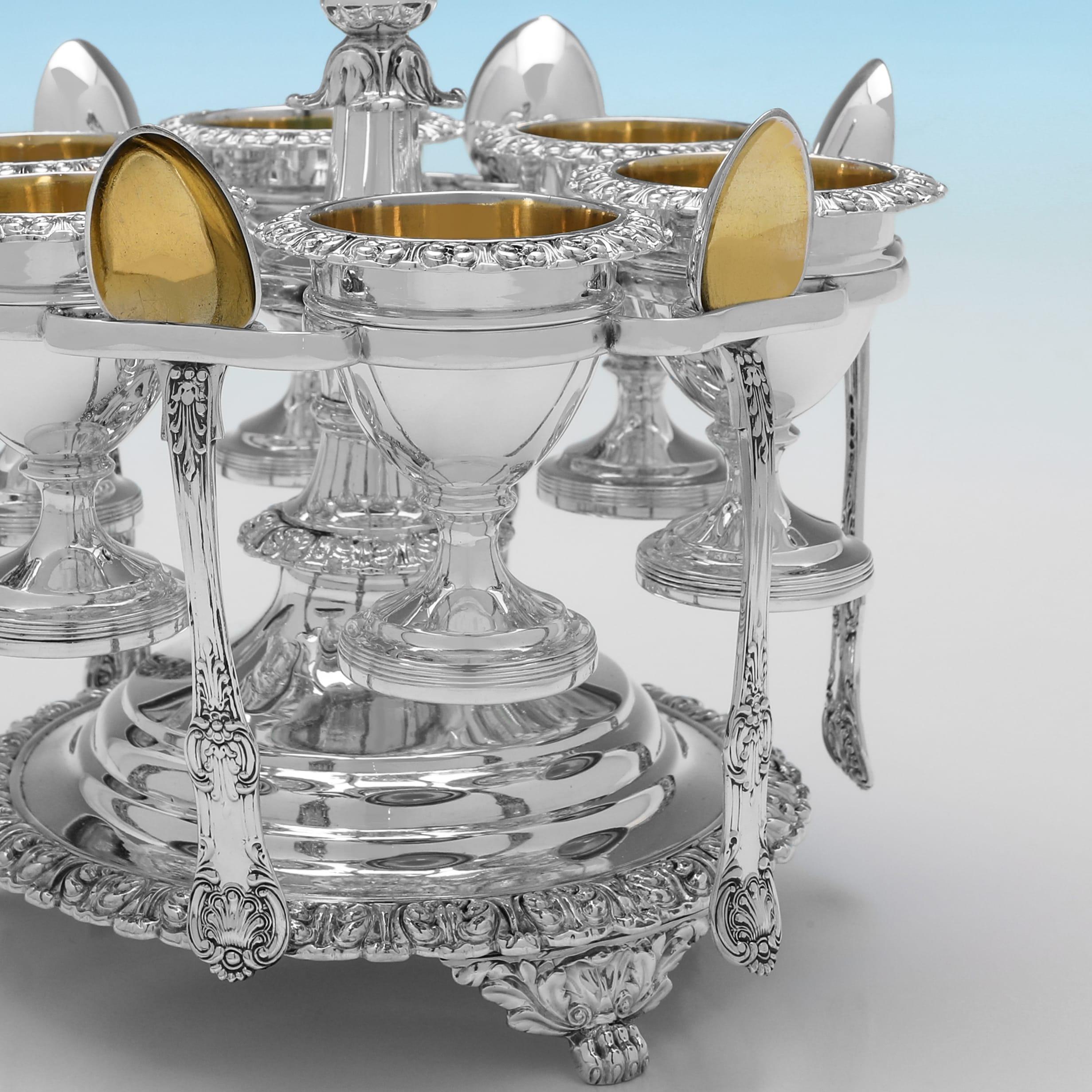 Hallmarked in Edinburgh in 1824 by James Mckay, this wonderful, George IV period, Antique Sterling Silver Egg Cruet, is ornate in design, with 6 egg cups and spoons all with gilt interiors. The egg cruet measures 8