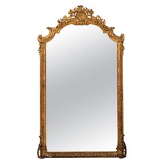Ornate Gilt Mirror with Carved Crest