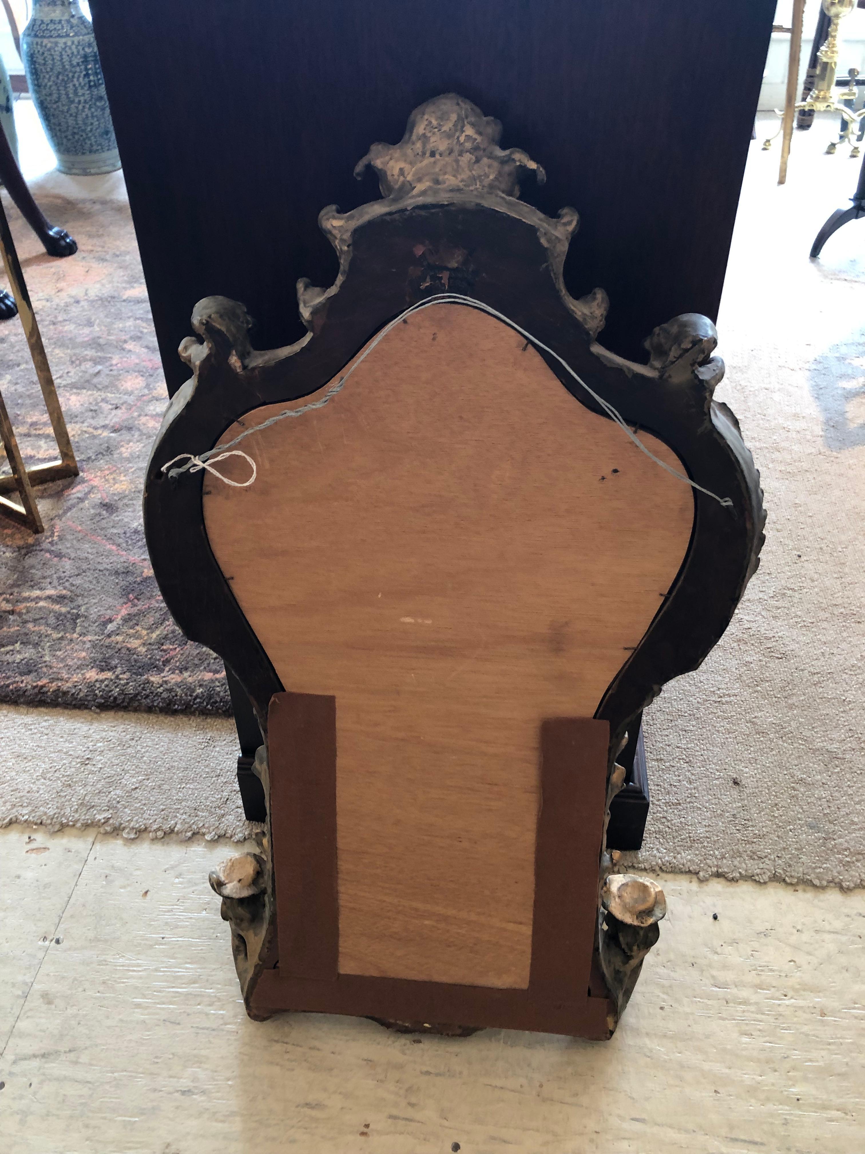 Ornate Gothic Style Gilded Mirror with Cherub and Masks For Sale 4