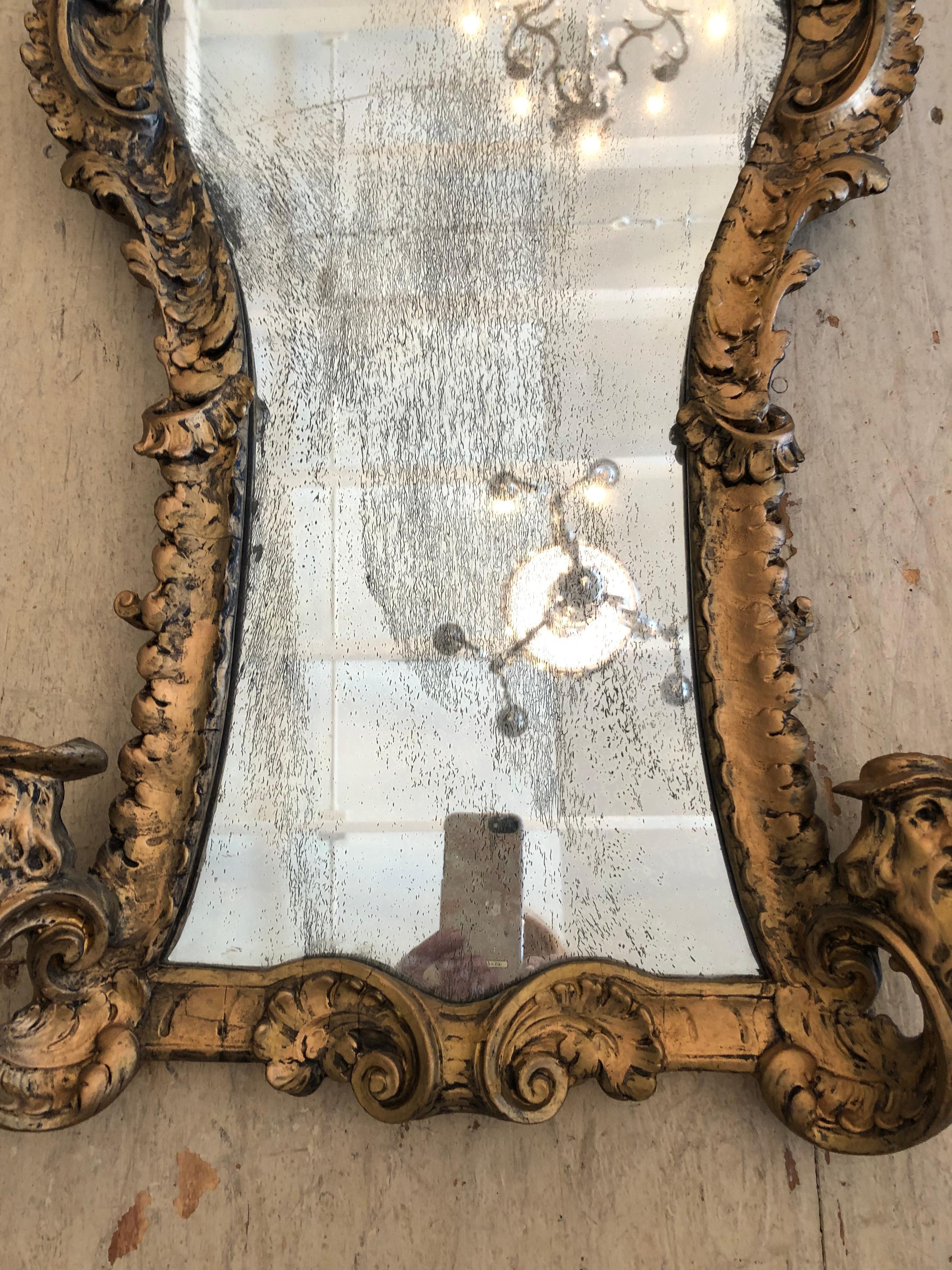 Gesso Ornate Gothic Style Gilded Mirror with Cherub and Masks For Sale