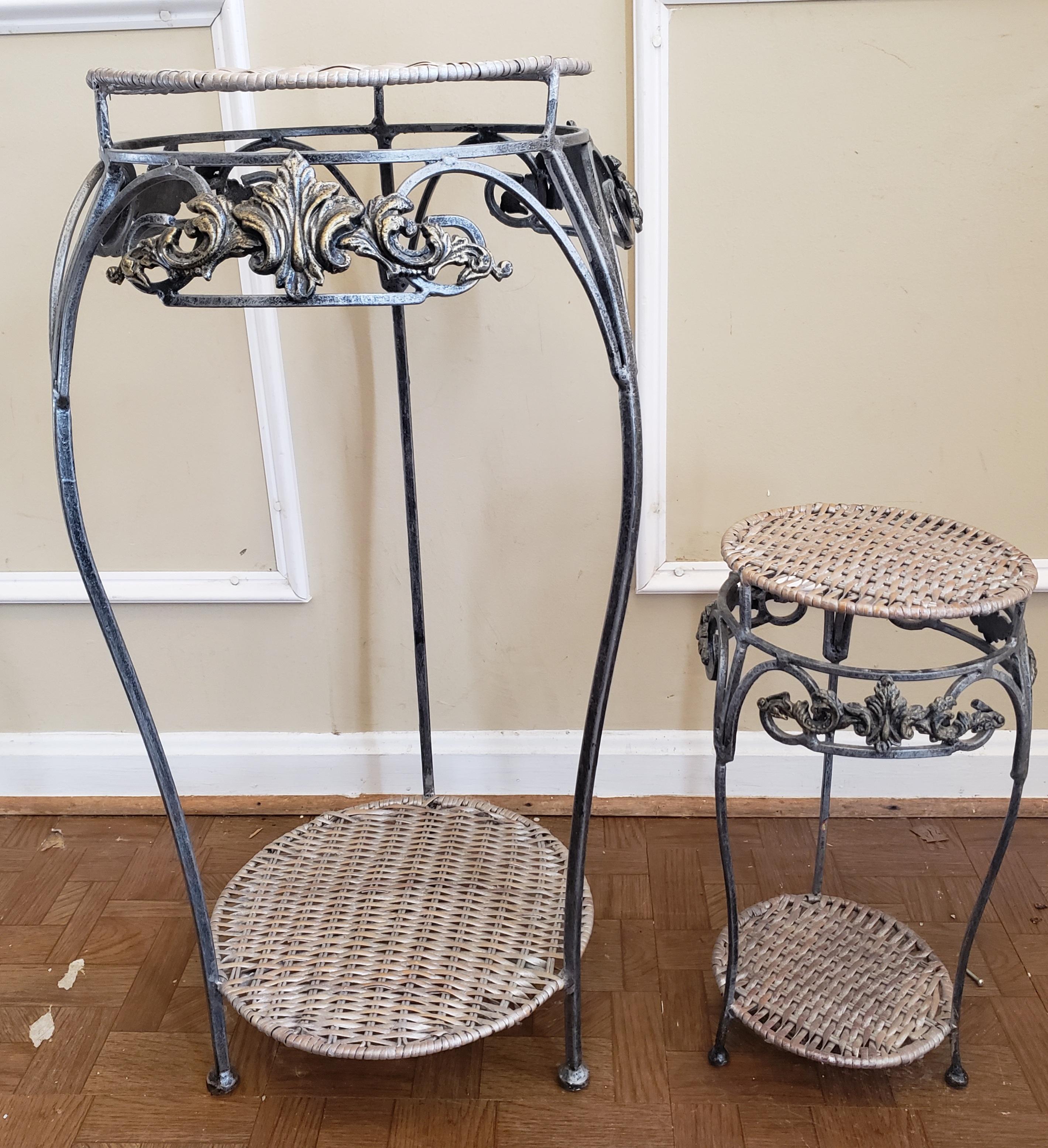 Pair of Ornate iron and wicker stands in excellent condition. 
Larger table measures 14
