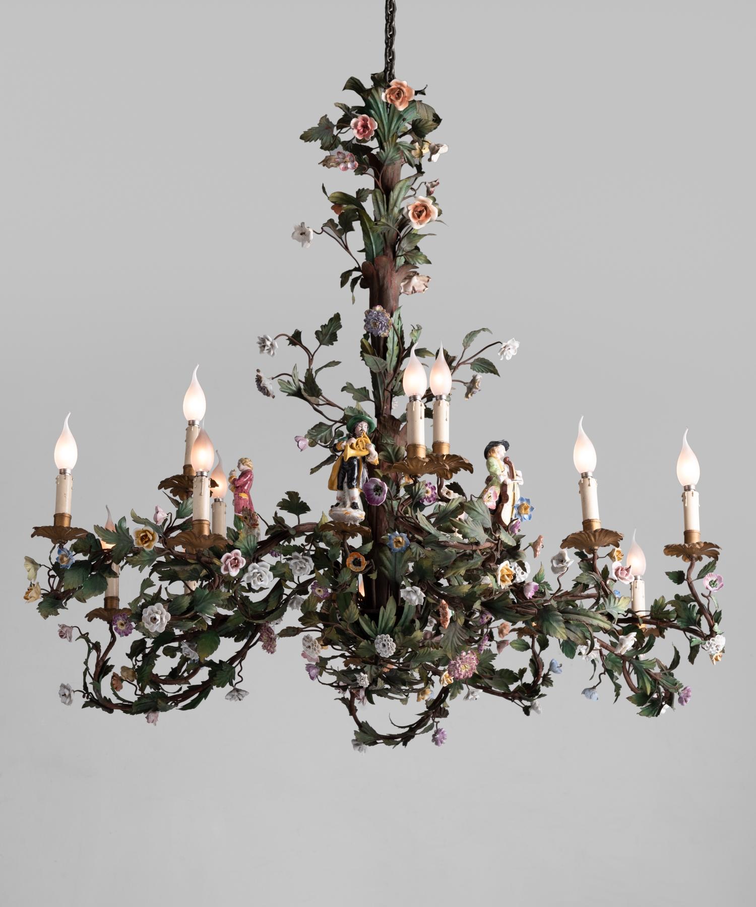 Iron Floral Chandelier with Porcelain Figures, Italy circa 1920

Exquisite hand-painted iron leaves with porcelain floral elements and hand-painted porcelain musical figurines.