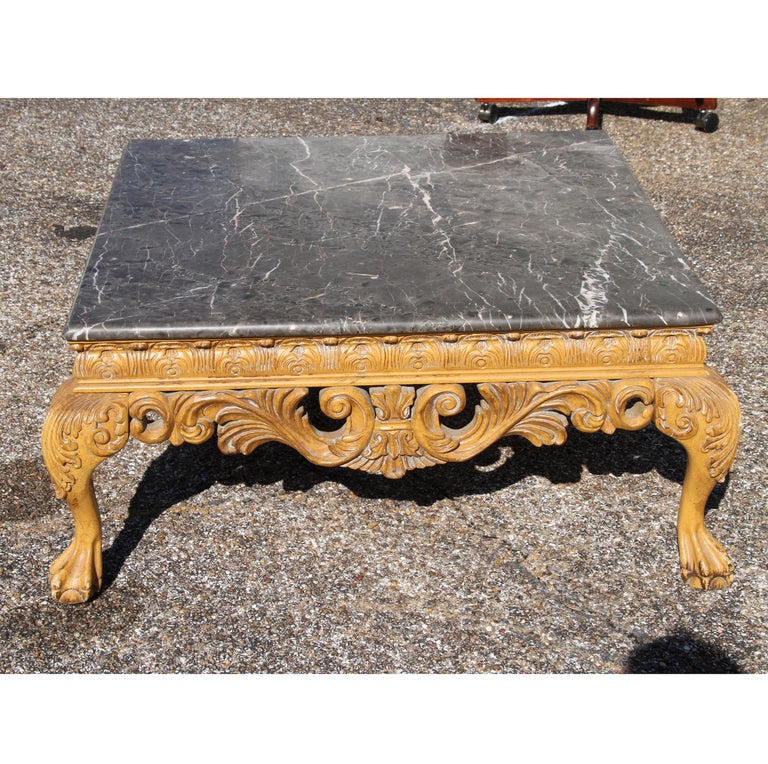 Italian carved marble coffee table
1920s

Stunning vintage Italian marble-top coffee table with a heavily carved base. Richly veined black marble.



Dimensions:
Height: 17 in 
Width: 36 in