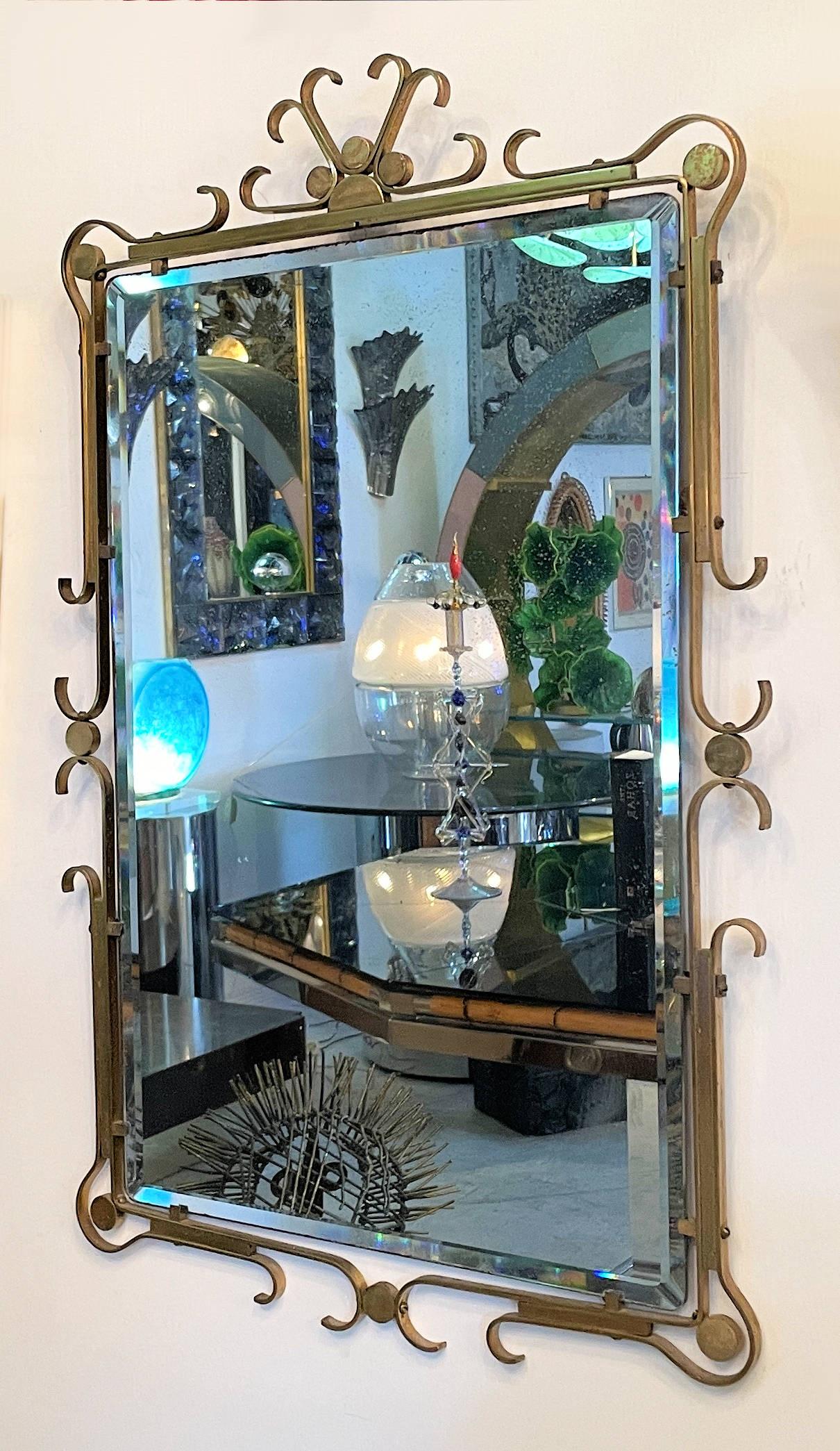 Mid-Century Modern polished brass frame in an ornate modern design. The quality is very solid and enduring. It is very elegantly hand made with extreme care to detail. A gorgeous eye catching piece in any room, in the style of  Gio Ponti, circa