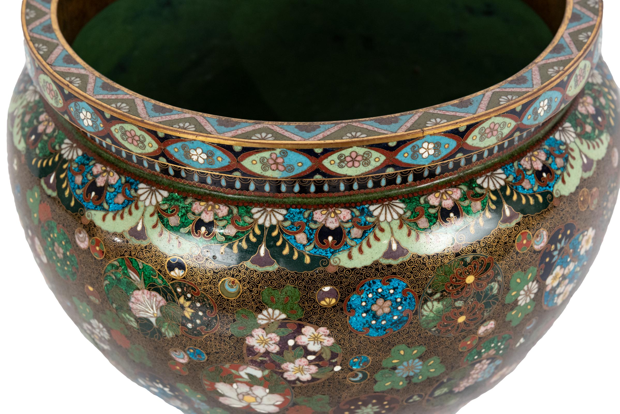 An excellent quality example of the finest Japanese Cloissoné, this jardinière is decorated with a variety of floral roundels, late 19th century.