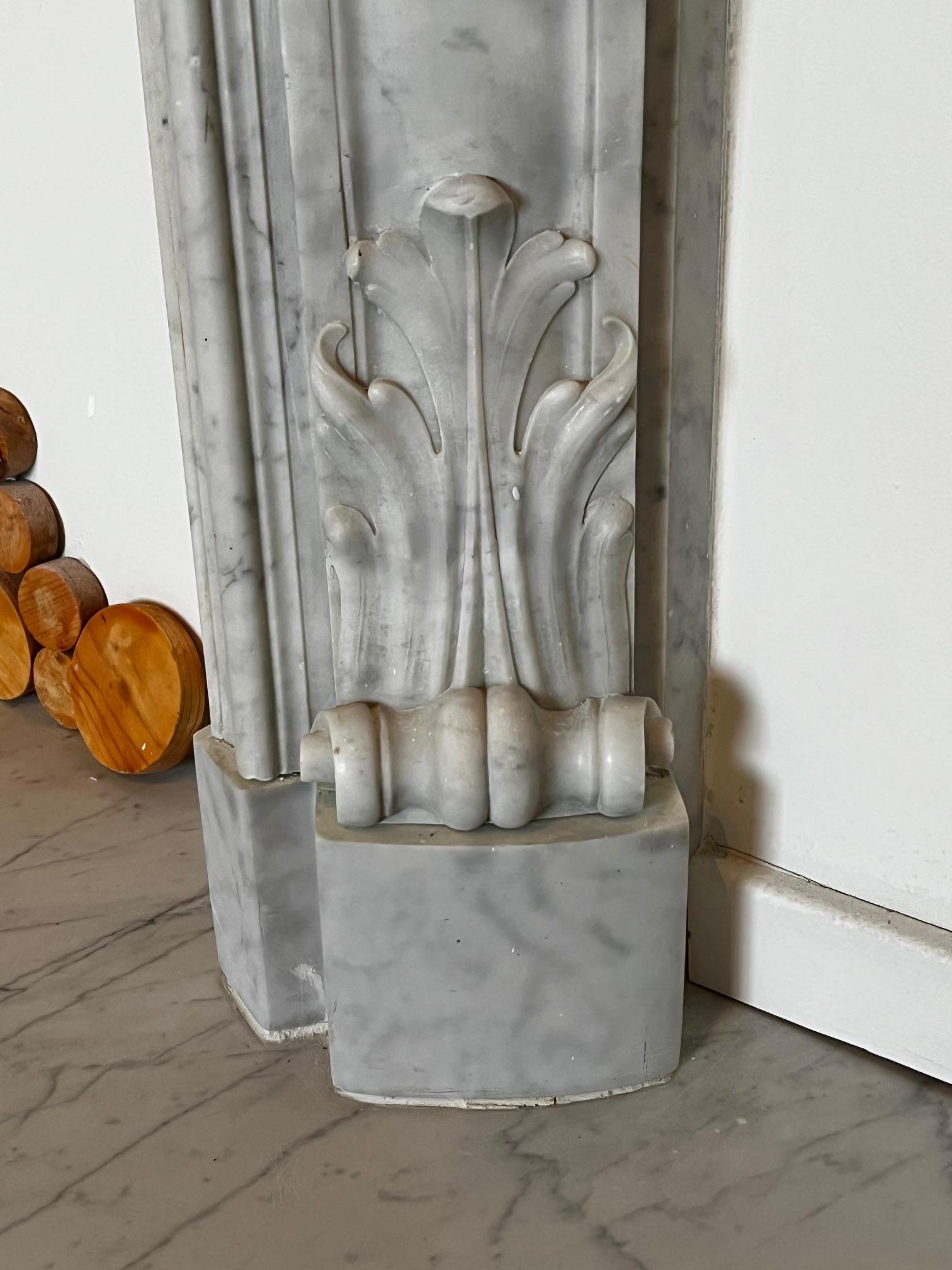 Ornate Louis XV-Style Fireplace Hand-Carved in Carrara Marble  In Good Condition For Sale In Chicago, IL