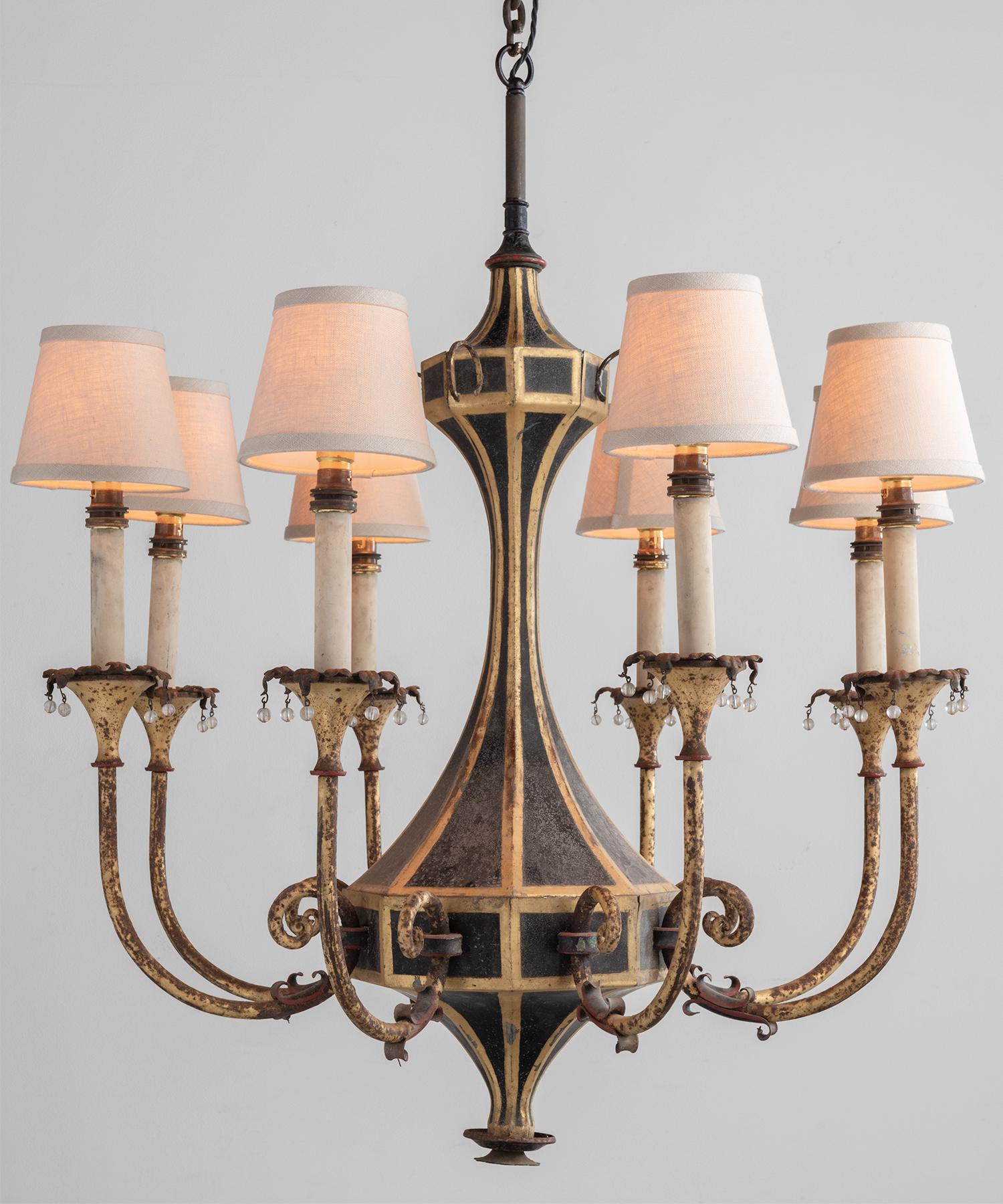 Ornate metal chandelier, France, circa 1920.

Hand-painted metal chandelier with original patina. Elegant form with new linen shades.

Measures: 30