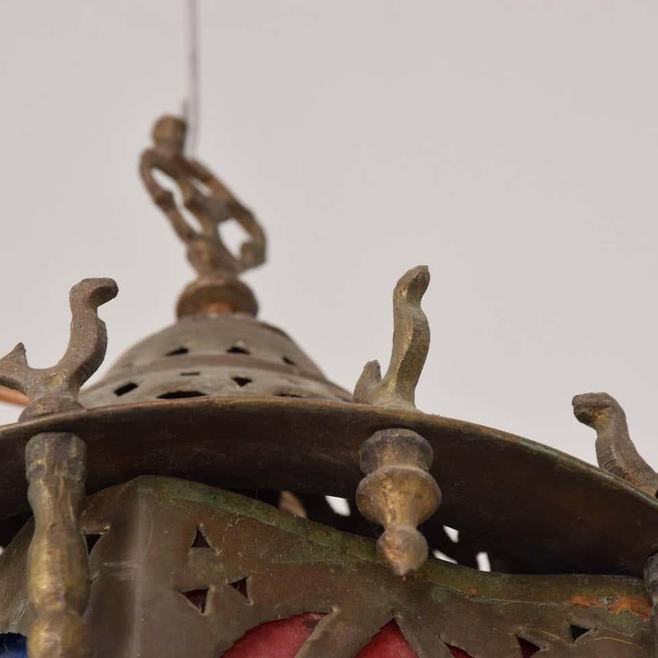 Mid-20th Century Ornate Moroccan Pierced Brass Hanging Lamp Festive Colors Rooster Lantern Light