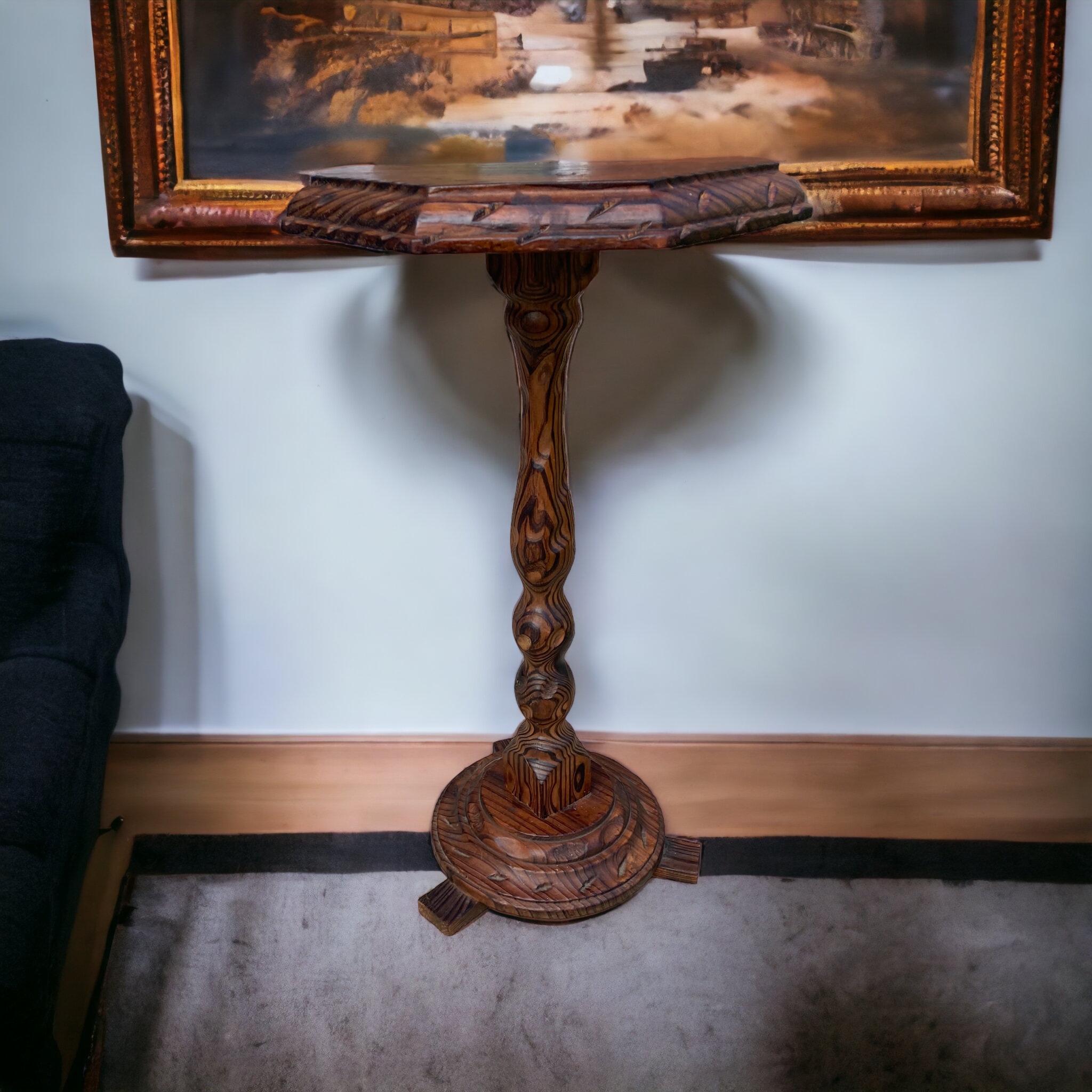 Ornate Pine Jardinere or Wine Glass Table. Stained Dark Oak, carved removeable screw top on a beautiful turned stem on tri feet. Wonderful grain on wood to give real charm and character.

H: 62 cm

W: 33 cm