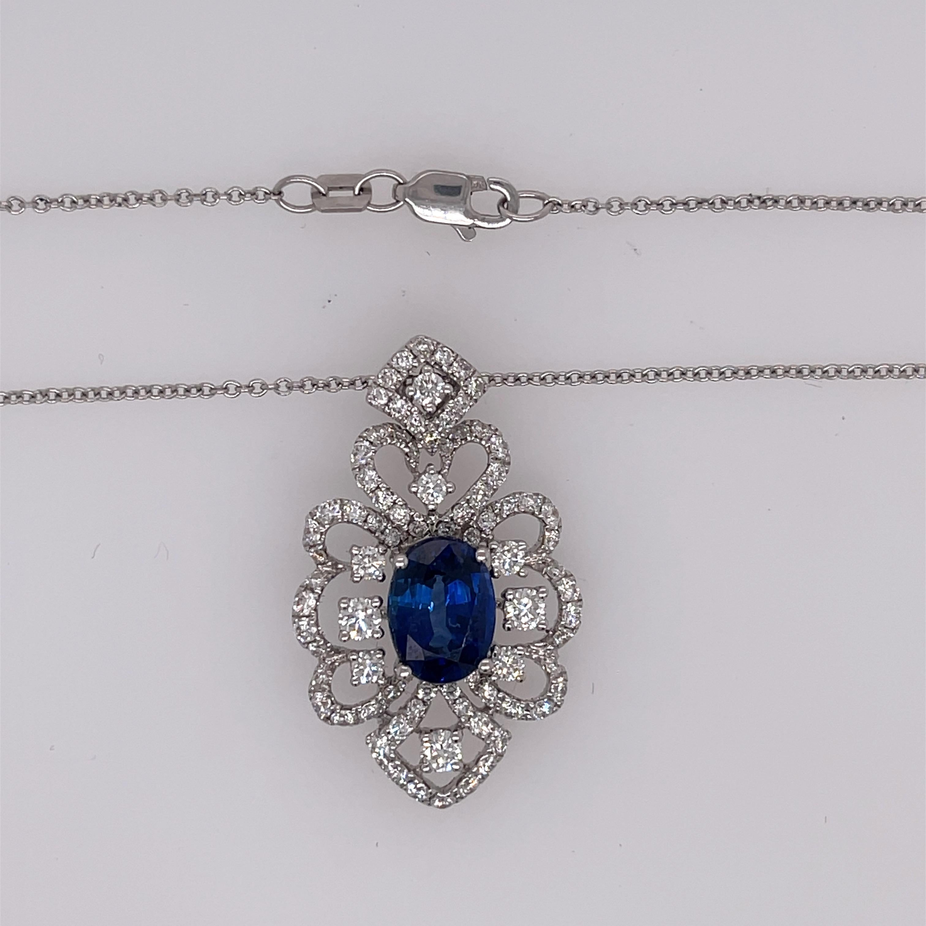 Oval Cut Ornate Sapphire and Diamond Pendant Necklace For Sale