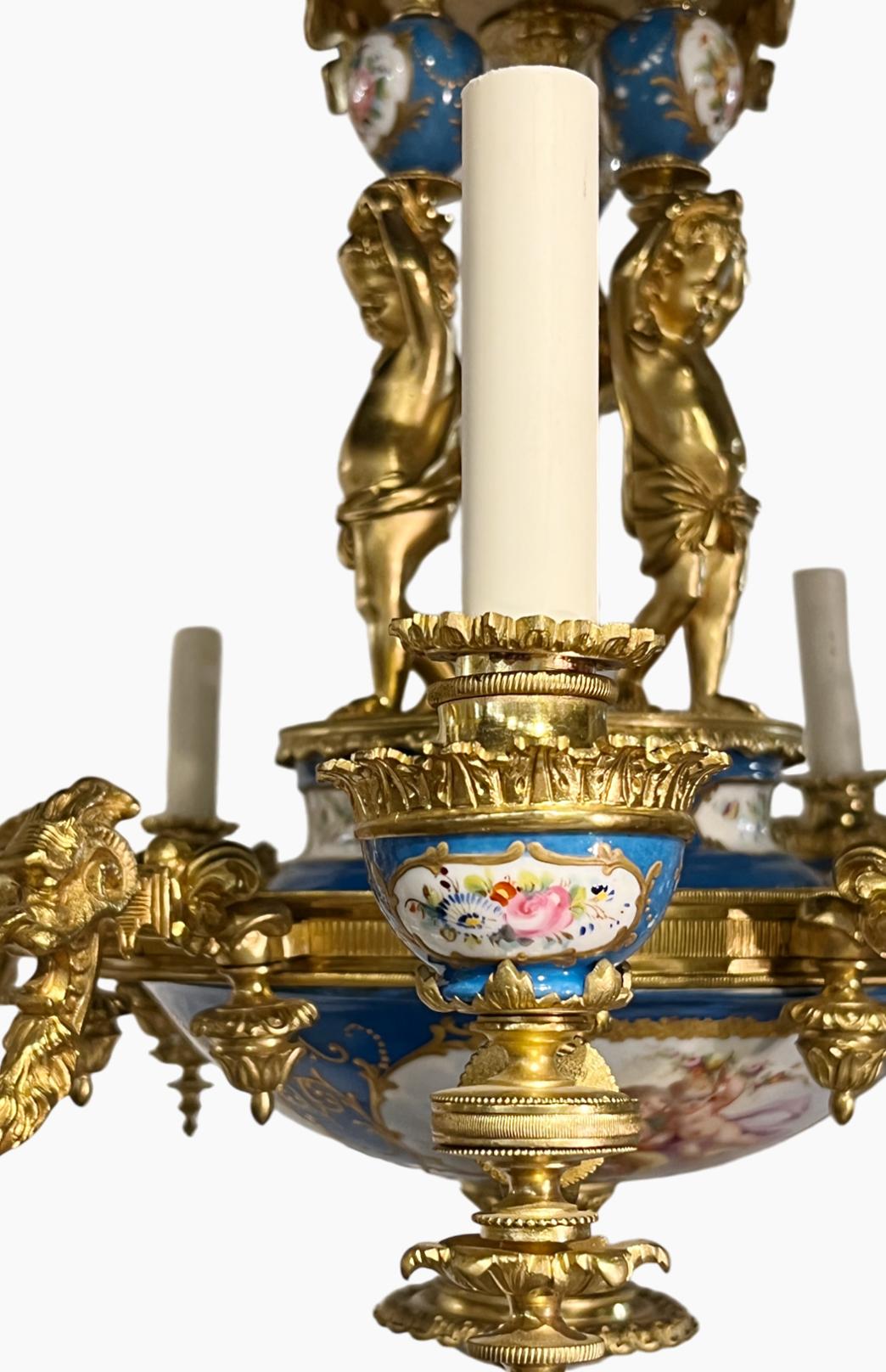 Ornate Sevres style Porcelain and Ormolu Putti Chandelier In Good Condition For Sale In New York, NY