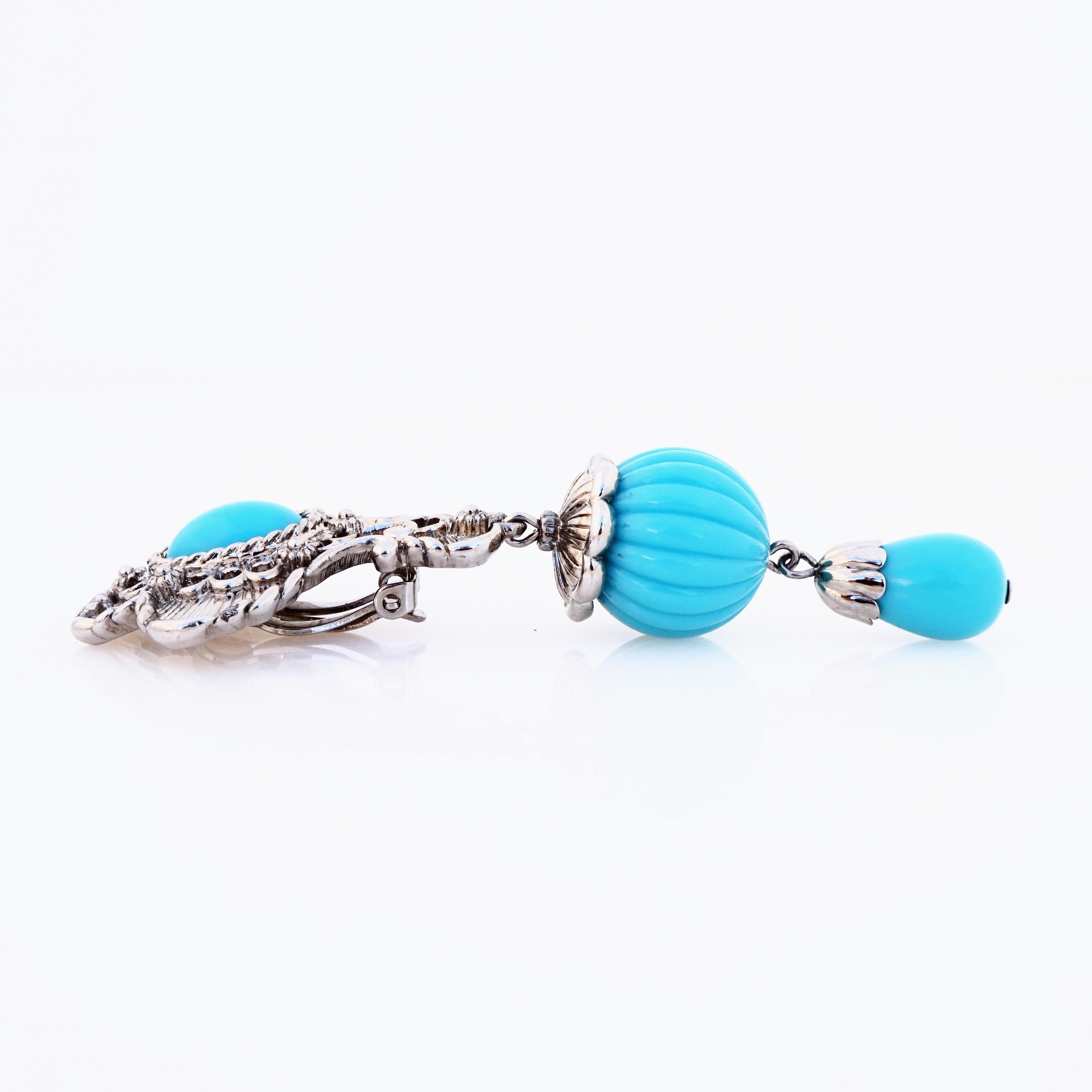 ornate turquoise cloured earrings