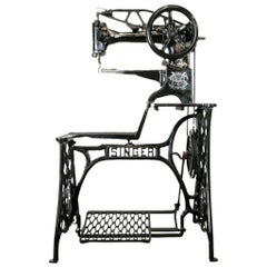 Ornate Singer Cobbler Sewing Machine on a Treadle Stand
