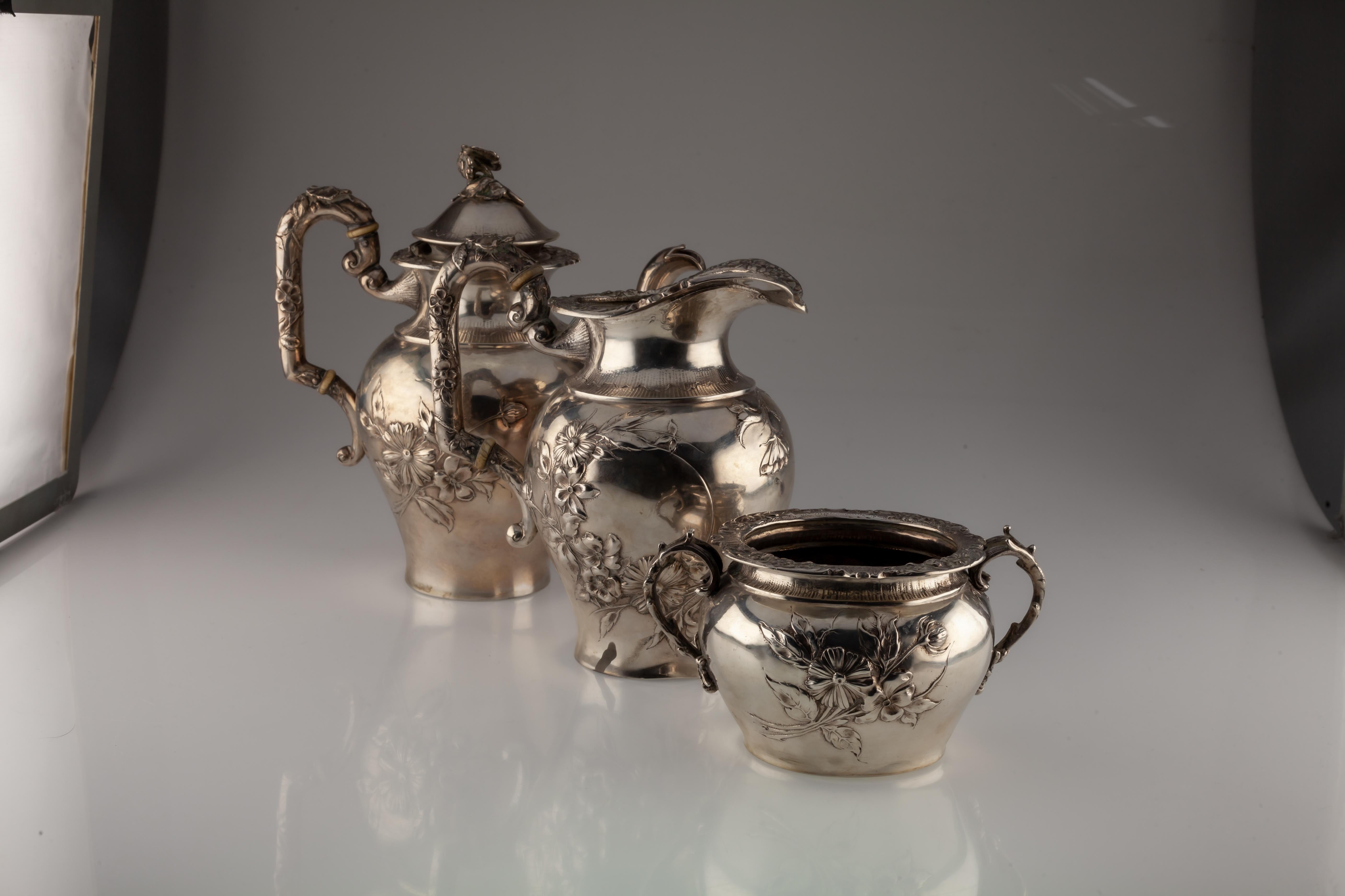 
Ornate Sterling Silver British Tea/Coffee Set 1930s Hand-Chased

Gorgeous Lot of 3 Coffee Set Pieces
London Assay Mark, Date Mark Indicates 1937
Includes Coffee Pot, Creamer/Pitcher, and Sugar
Coffee Pot
Appx 7 3/4