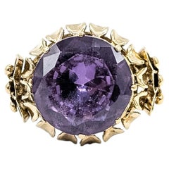 Verschnörkelter Ring mit synthetischem Saphir aus 14k Gelbgold