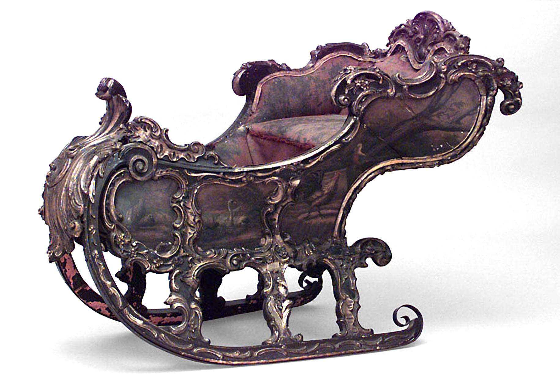 Russian (18/19th Cent) ornately painted and carved sleigh with carved shell front sleigh
