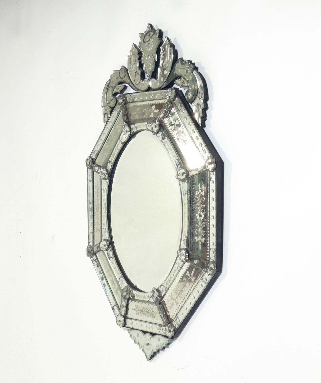 Ornate Venetian mirror, Italy, circa 1940s. Retains wonderful original patina.