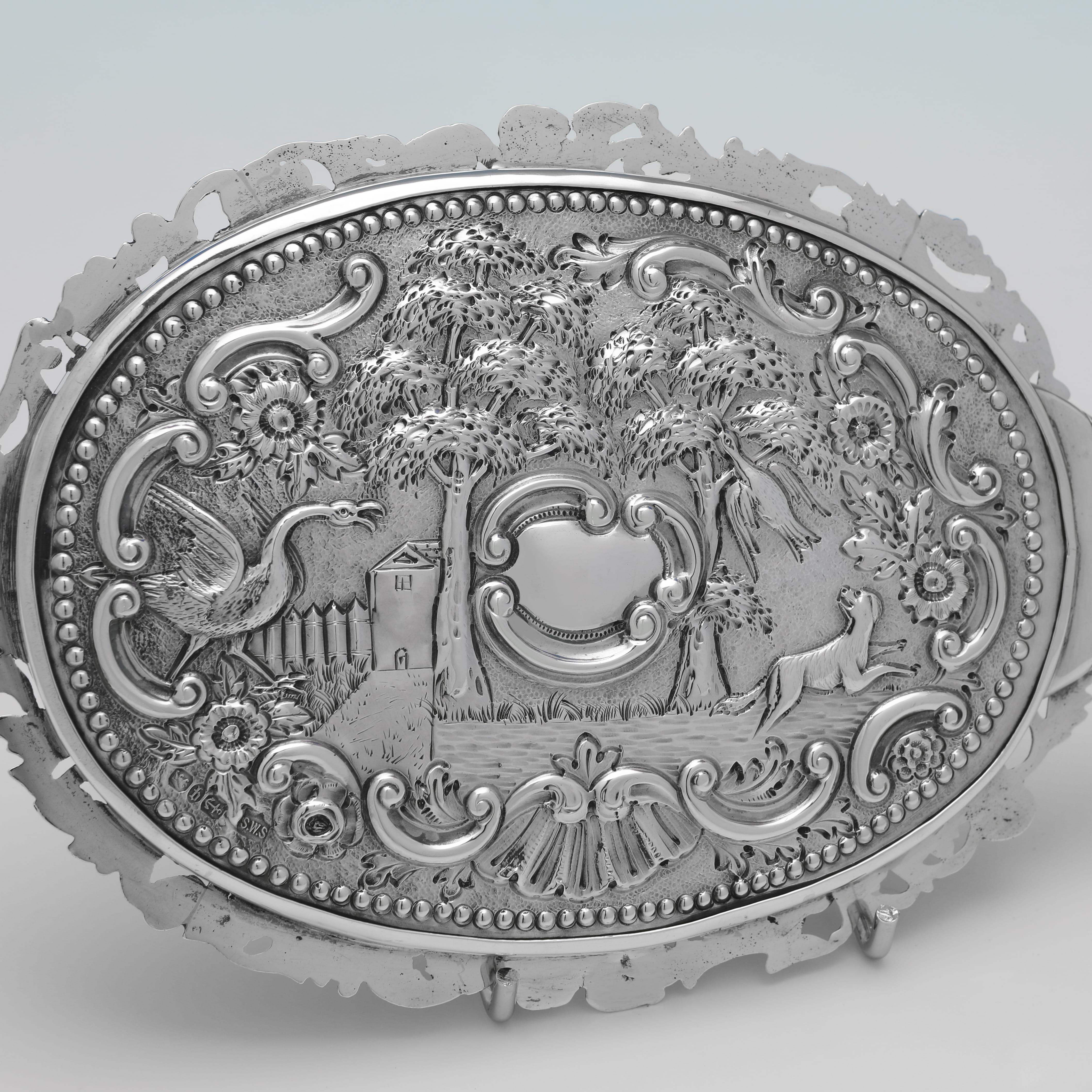 English Ornate Victorian sterling silver hand mirror made in 1890