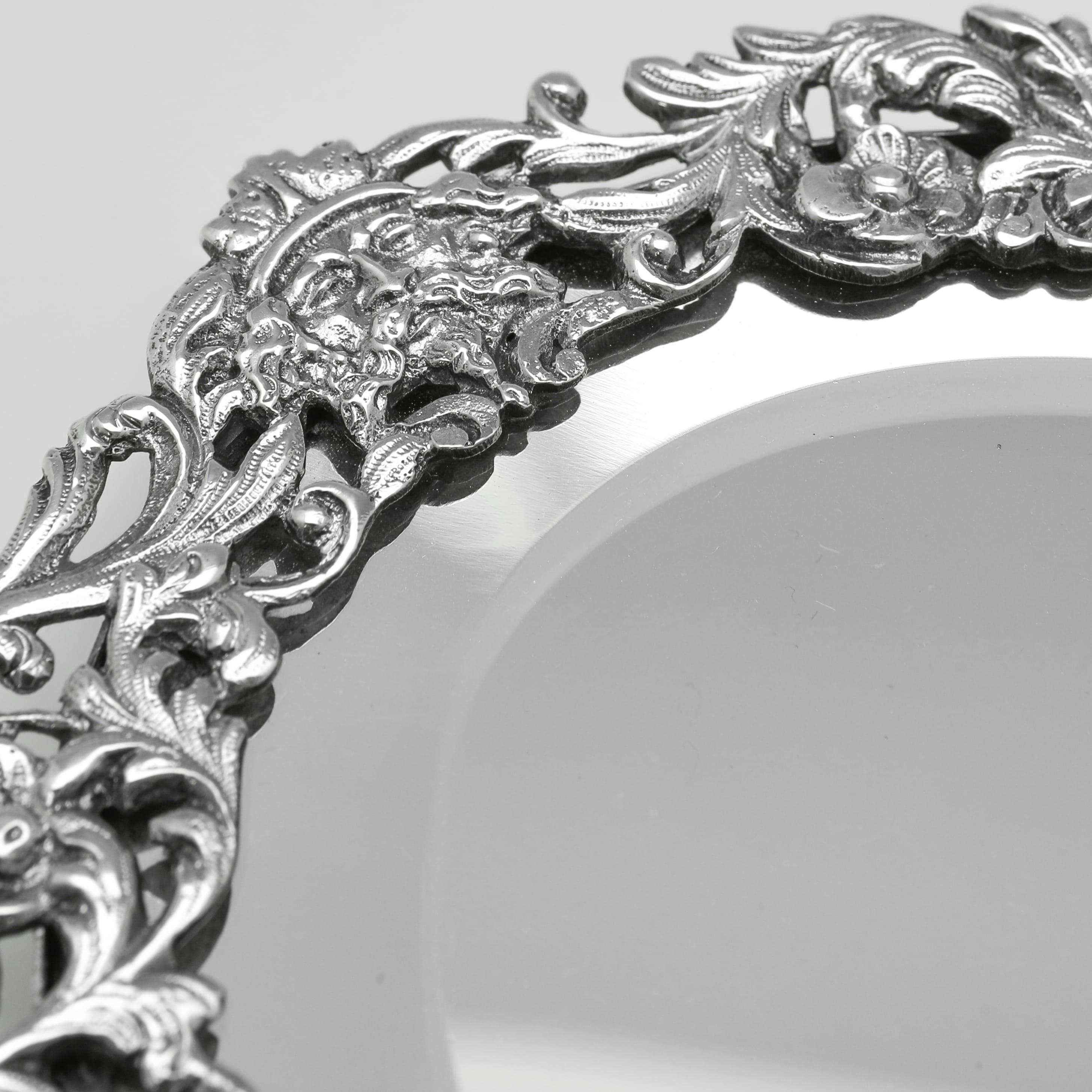 Late 19th Century Ornate Victorian sterling silver hand mirror made in 1890