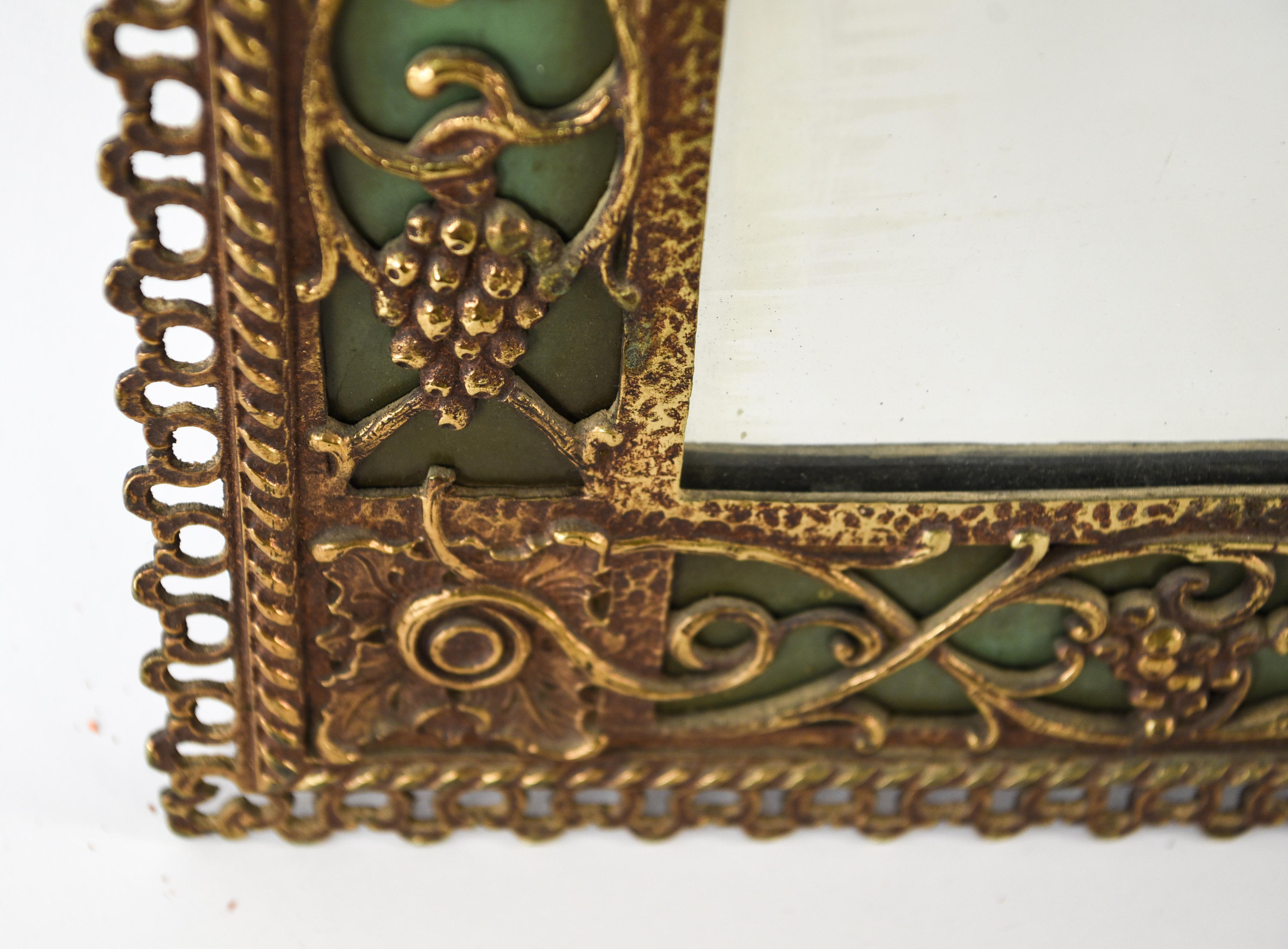 Brass Ornate Wall Mirror in the Manner of Oscar Bach