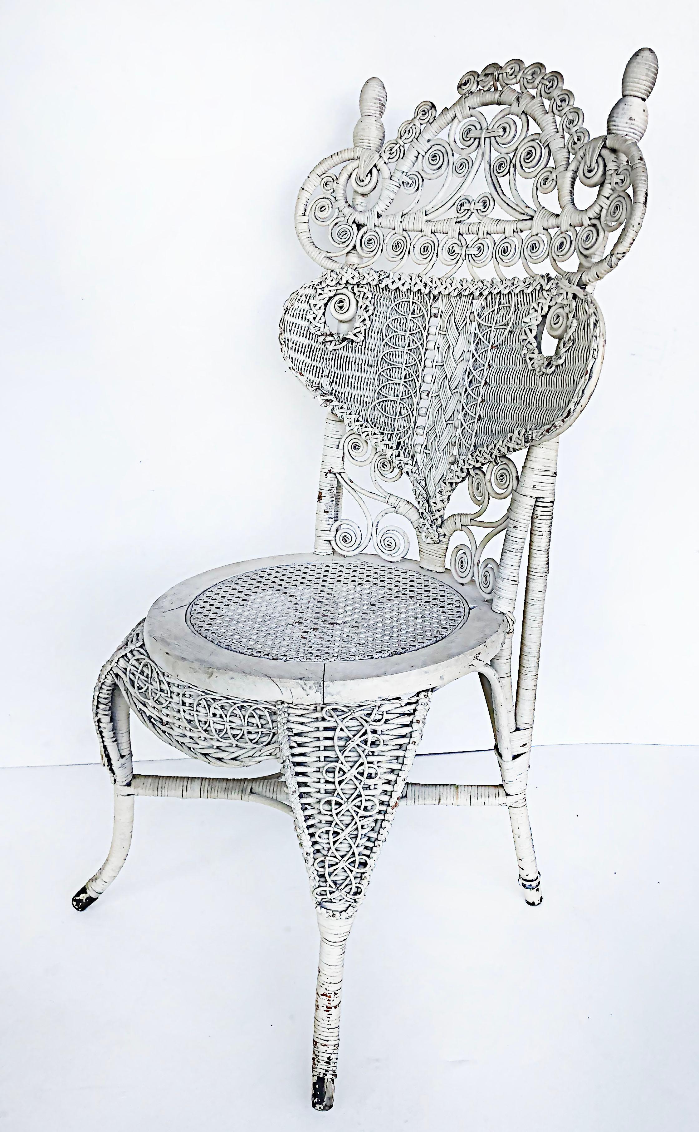 Ornate white painted Victorian Wicker chair 

Offered for sale is an ornate late Victorian white wicker chair. The chair has a vintage feel with some losses and wear to the painted finish.