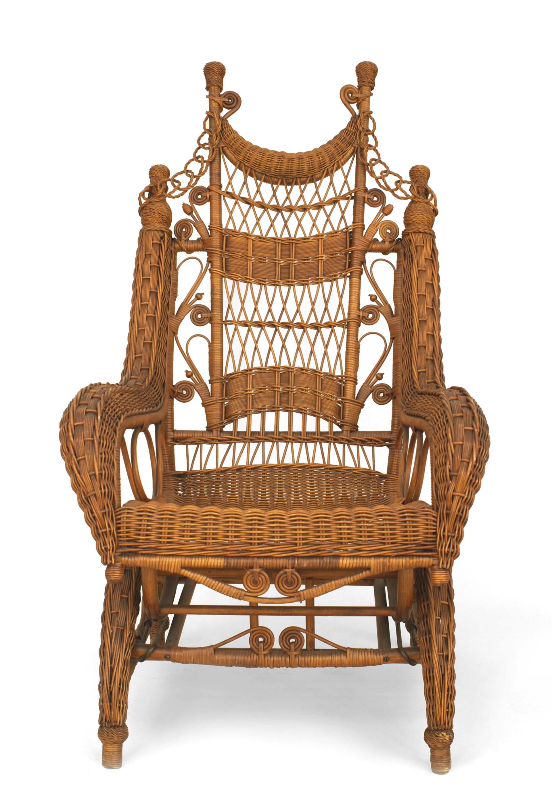 American Victorian natural wicker ornate high back platform rocking chair with woven rolled arms and finials on back (HEYWOOD BROS.)
