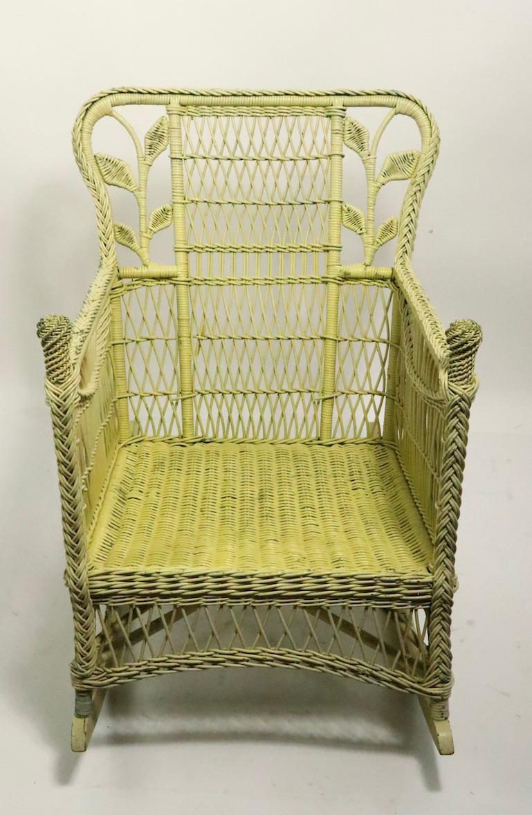 Victorian Ornate Wicker Rocking Chair Attributed to Heywood Brothers Company