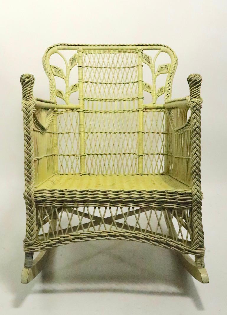 20th Century Ornate Wicker Rocking Chair Attributed to Heywood Brothers Company