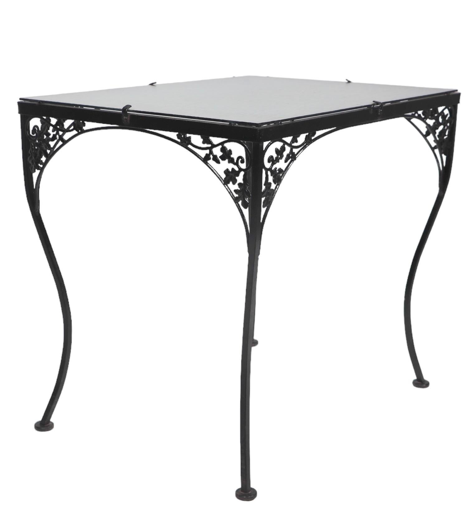 20th Century Ornate Wrought Iron and Glass Garden Patio Poolside Dining Table att. to Woodard For Sale