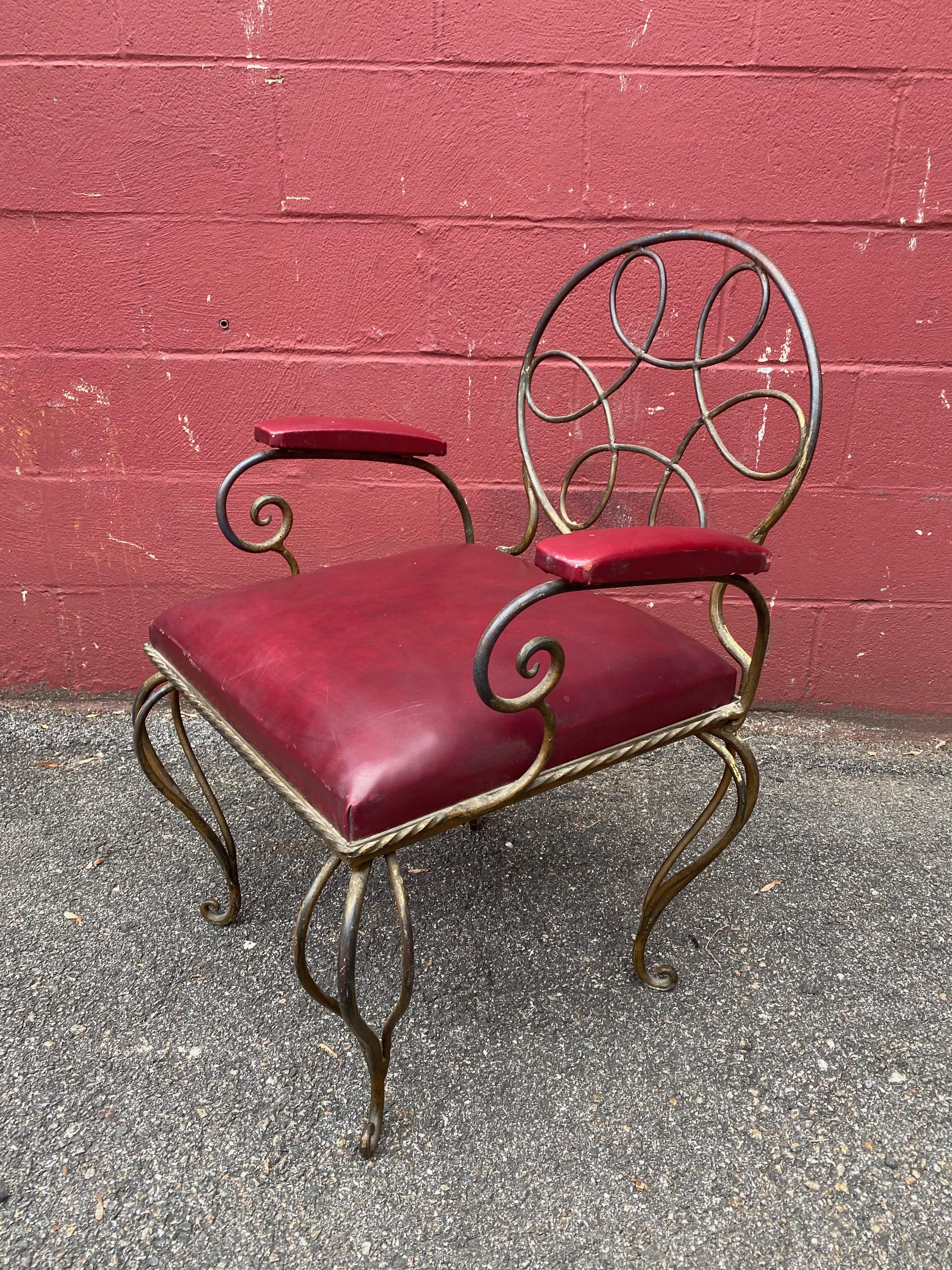 Mid-20th Century Ornate Wrought Iron Armchair in Oxblood Red Vinyl For Sale