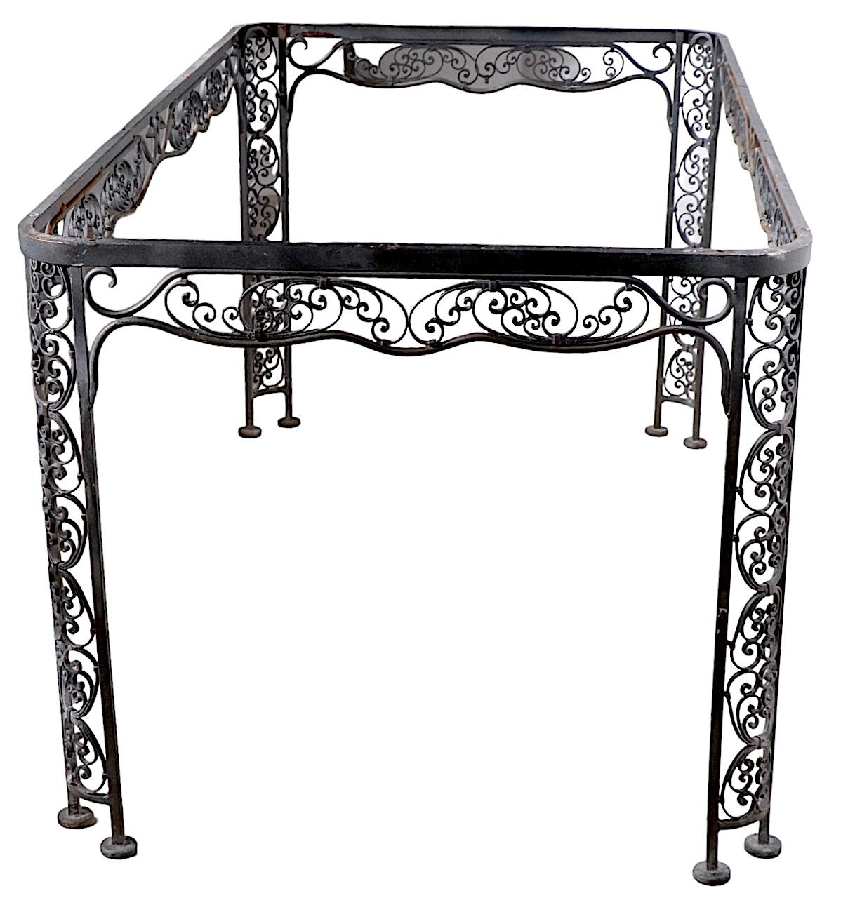 Ornate Wrought Iron Garden Patio Poolside Dining Table by Lee Woodard, c 1940's In Good Condition For Sale In New York, NY