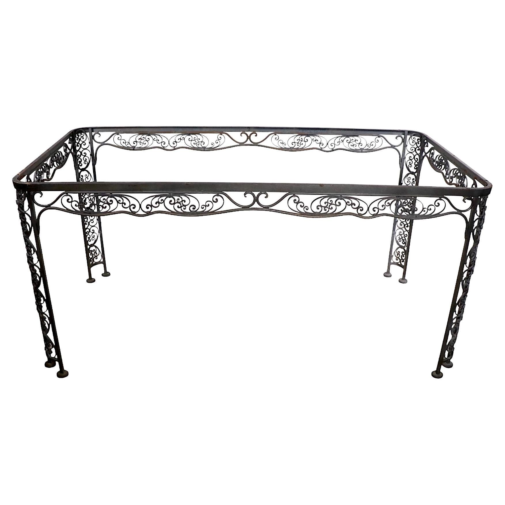 Ornate Wrought Iron Garden Patio Poolside Dining Table by Lee Woodard, c 1940's For Sale