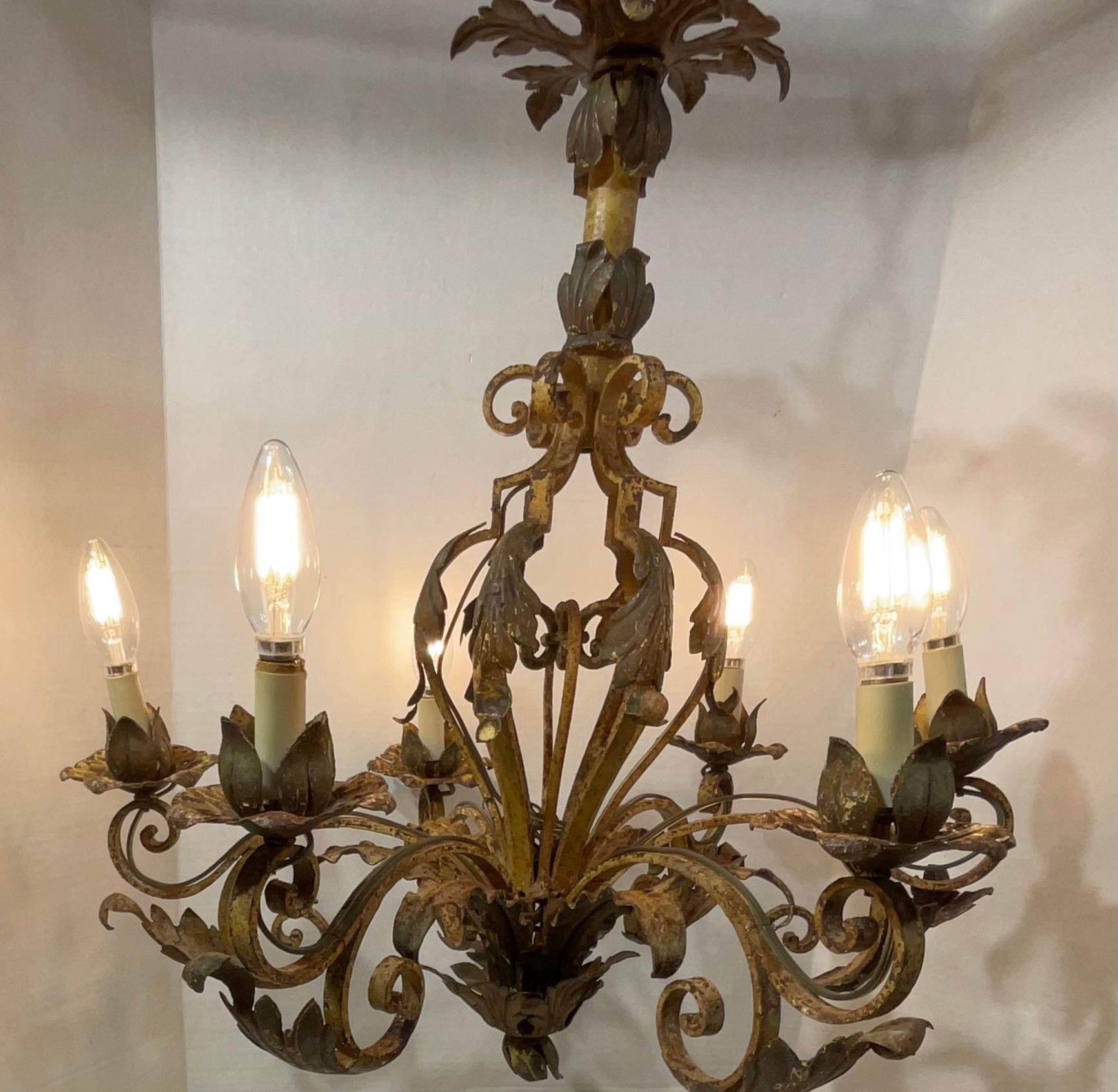Ornate Wrought Iron Mizner Style Chandelier In Good Condition For Sale In Delray Beach, FL