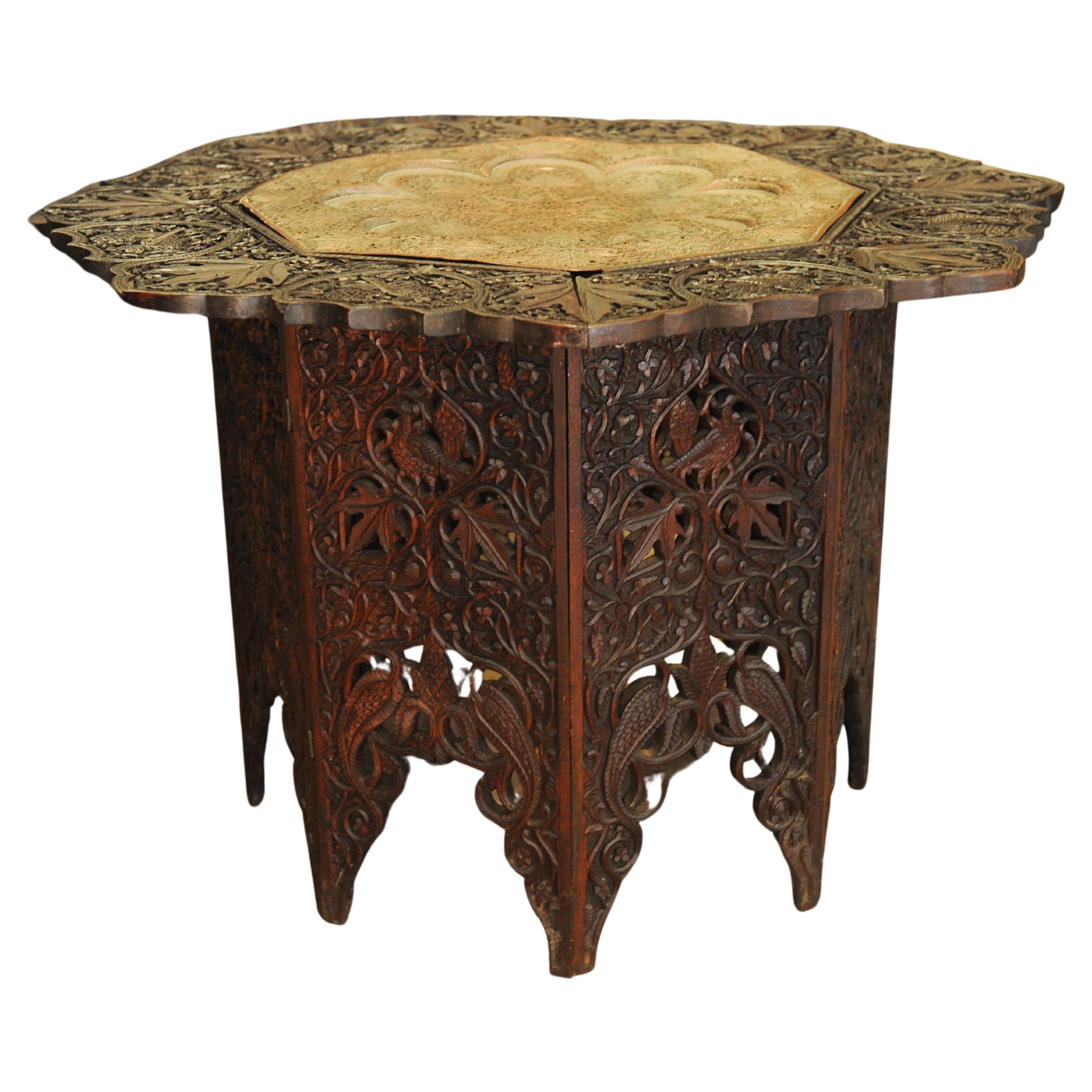 Central Asian Ornately Carved Asian Hardwood and Hammered Brass Table For Sale