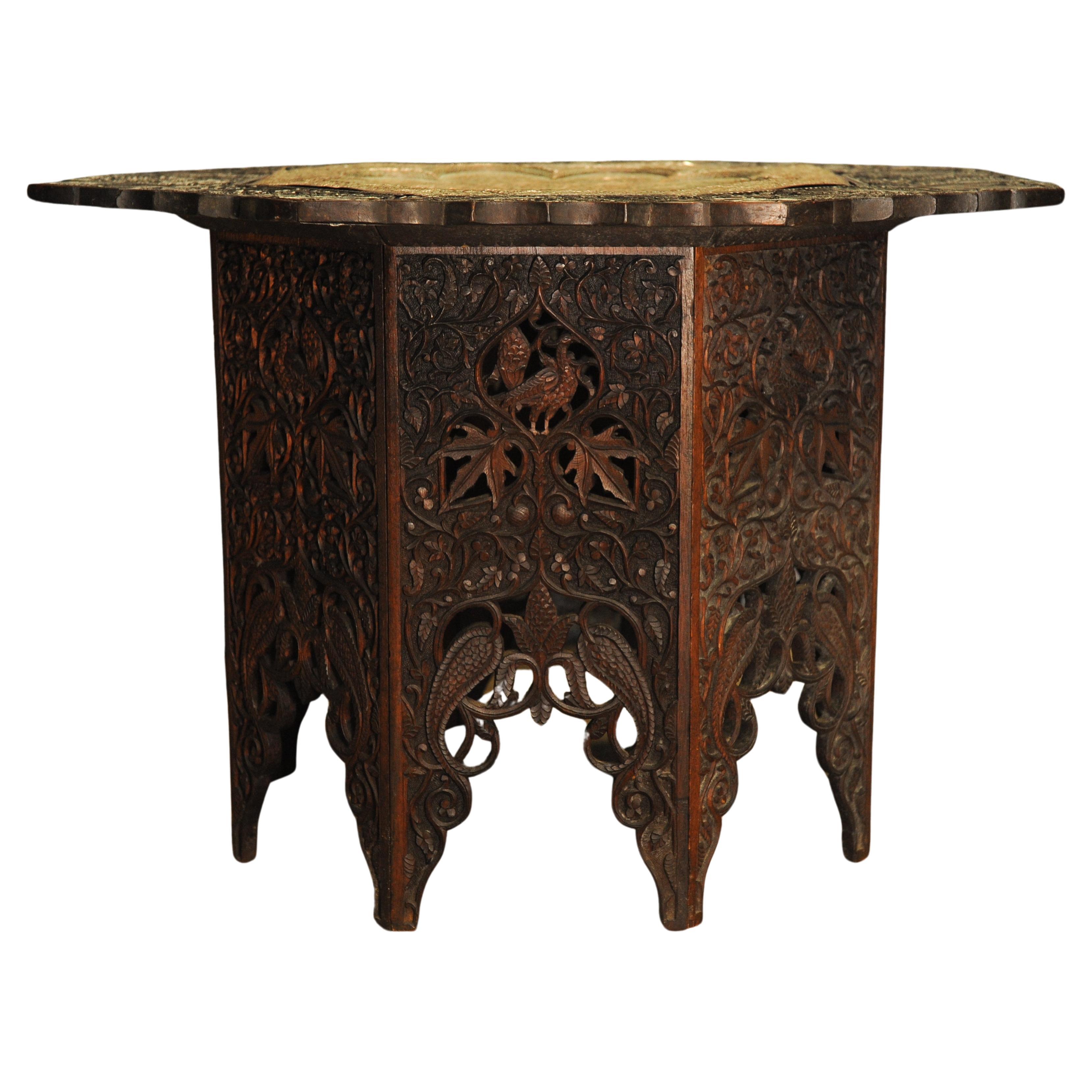 Ornately Carved Asian Hardwood and Hammered Brass Table In Good Condition For Sale In High Wycombe, GB