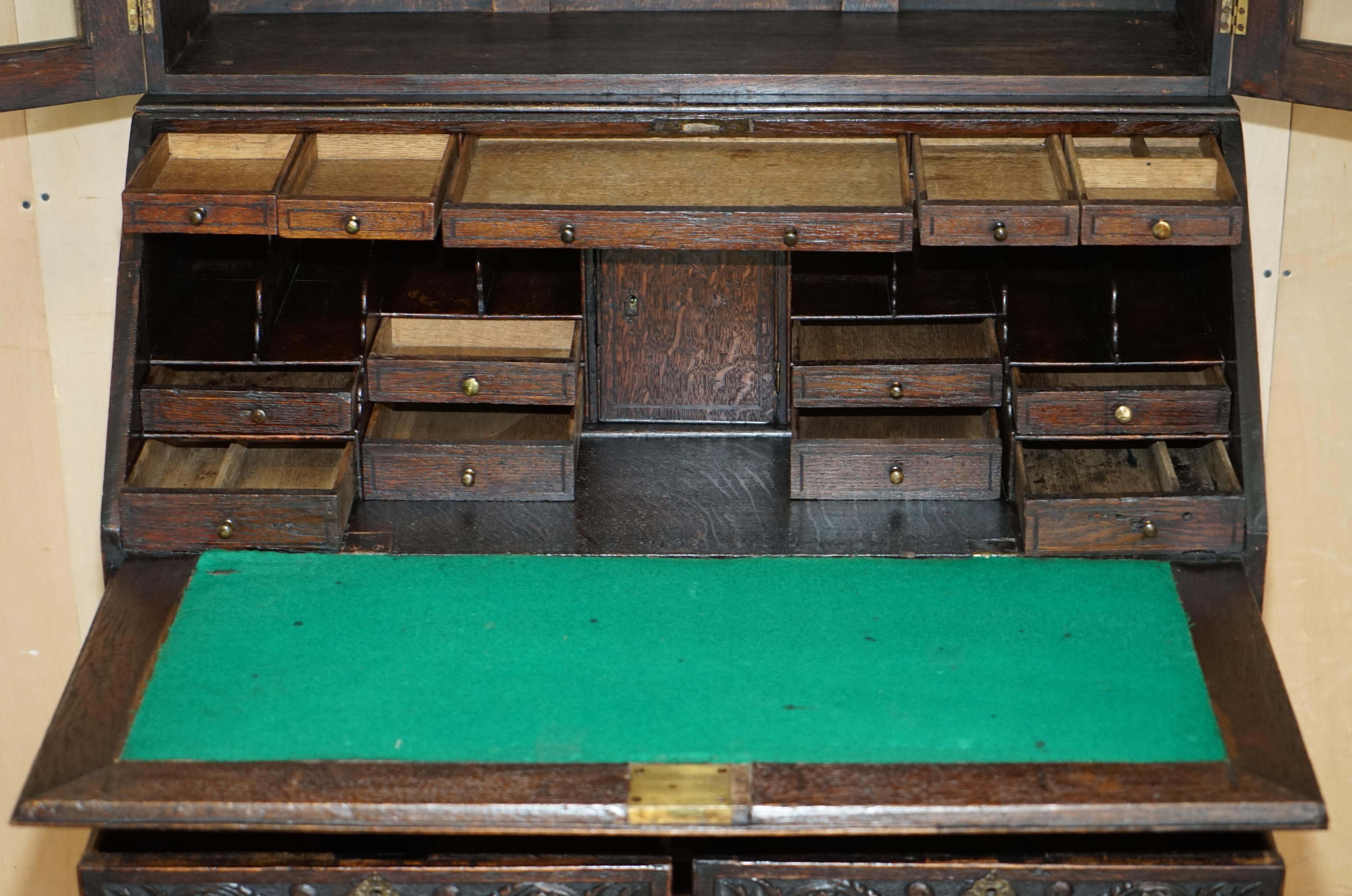 ORNATELY CARVED ENGLISH OAK LIBRARY BUREAU BOOKCASE LION'S HEAD BRASS HANDLES en vente 10