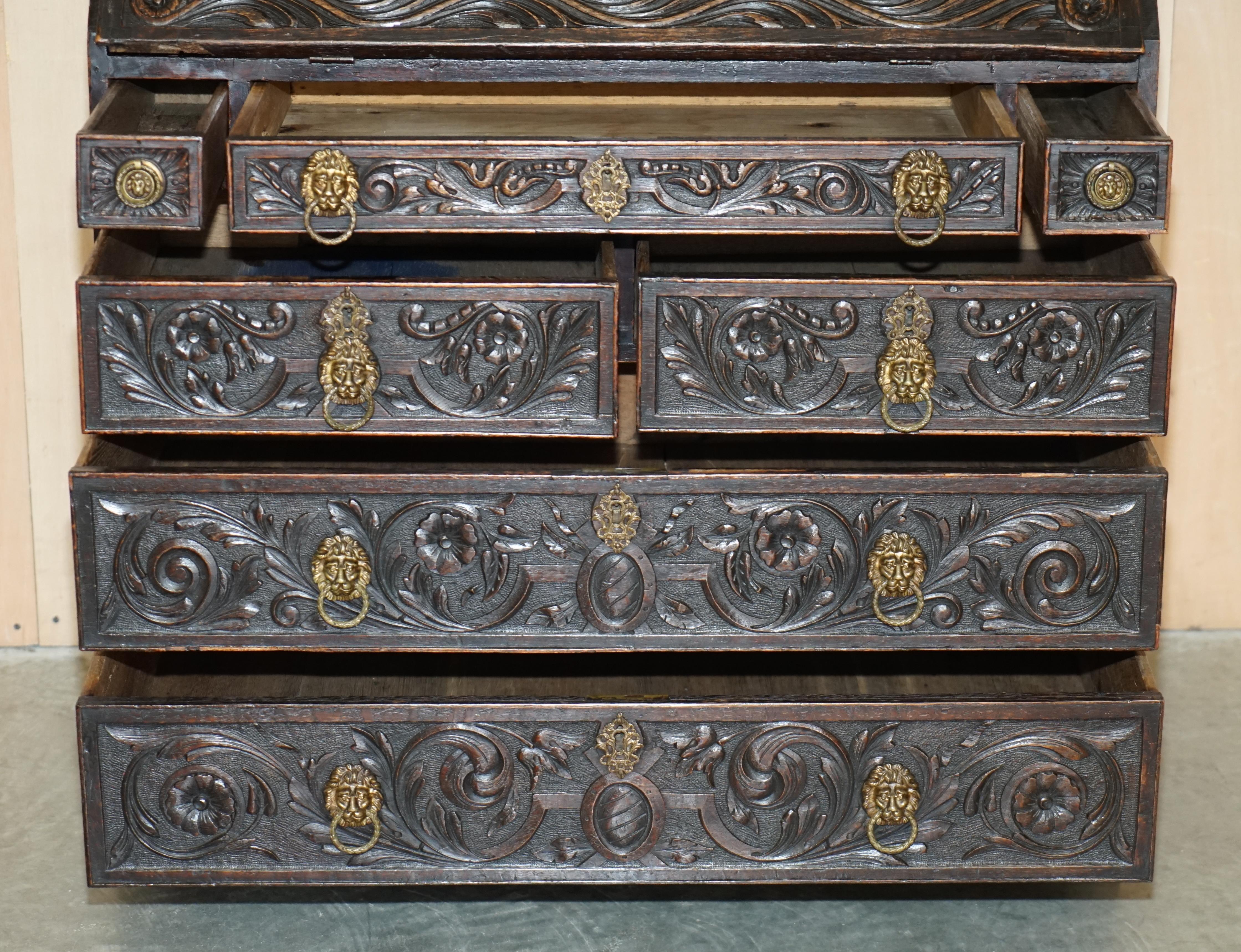 Ornately Carved English Oak Library Bureau Bookcase Lion's Head Brass Handles For Sale 14