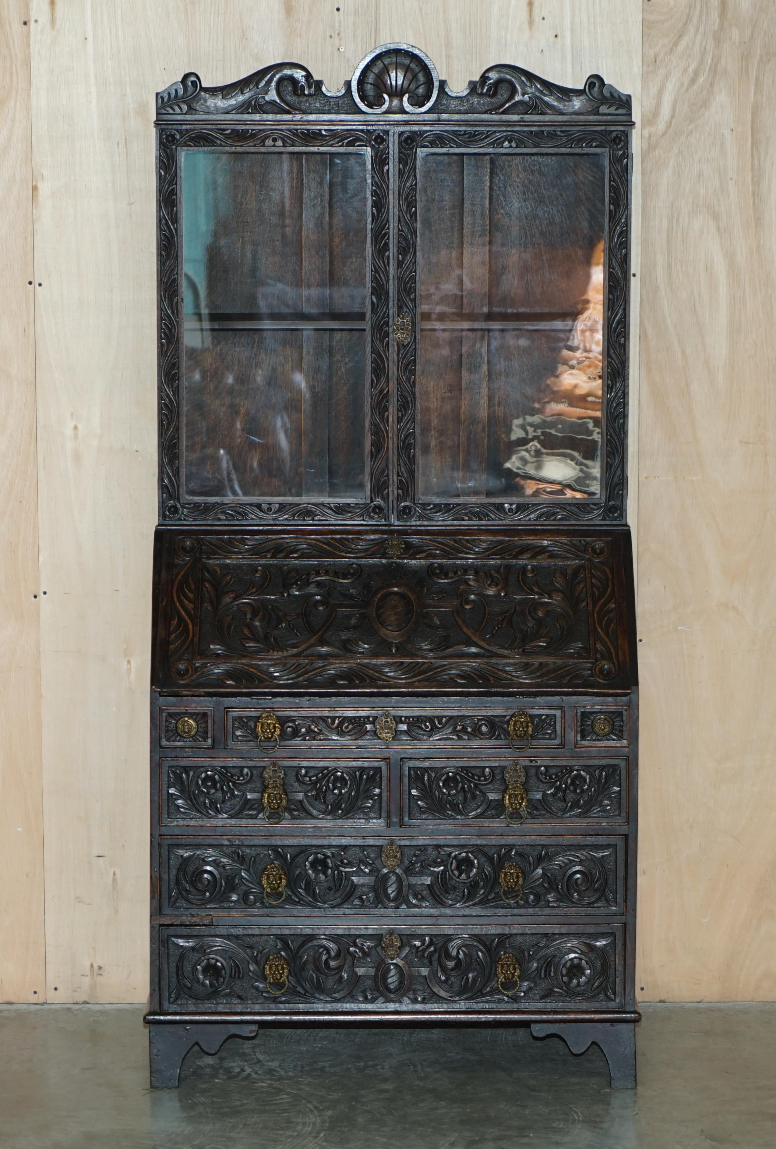 We are delighted to offer for sale this very rare and highly collectable, ornately carved, circa 1860 Jacobean revival, Antique Library Bureau bookcase

Please note the delivery fee listed is just a guide, it covers within the M25 only for the UK