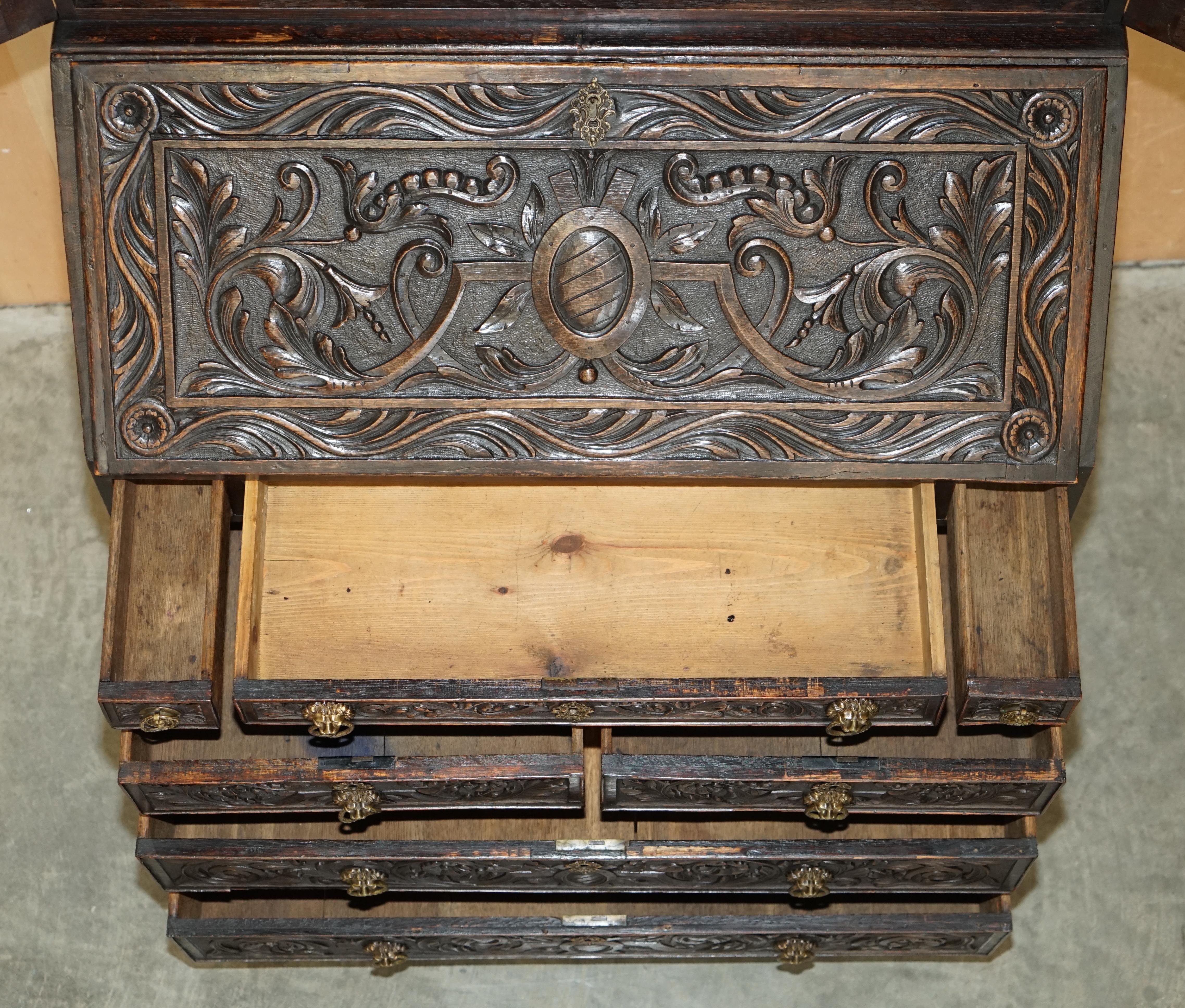 Ornately Carved English Oak Library Bureau Bookcase Lion's Head Brass Handles For Sale 14