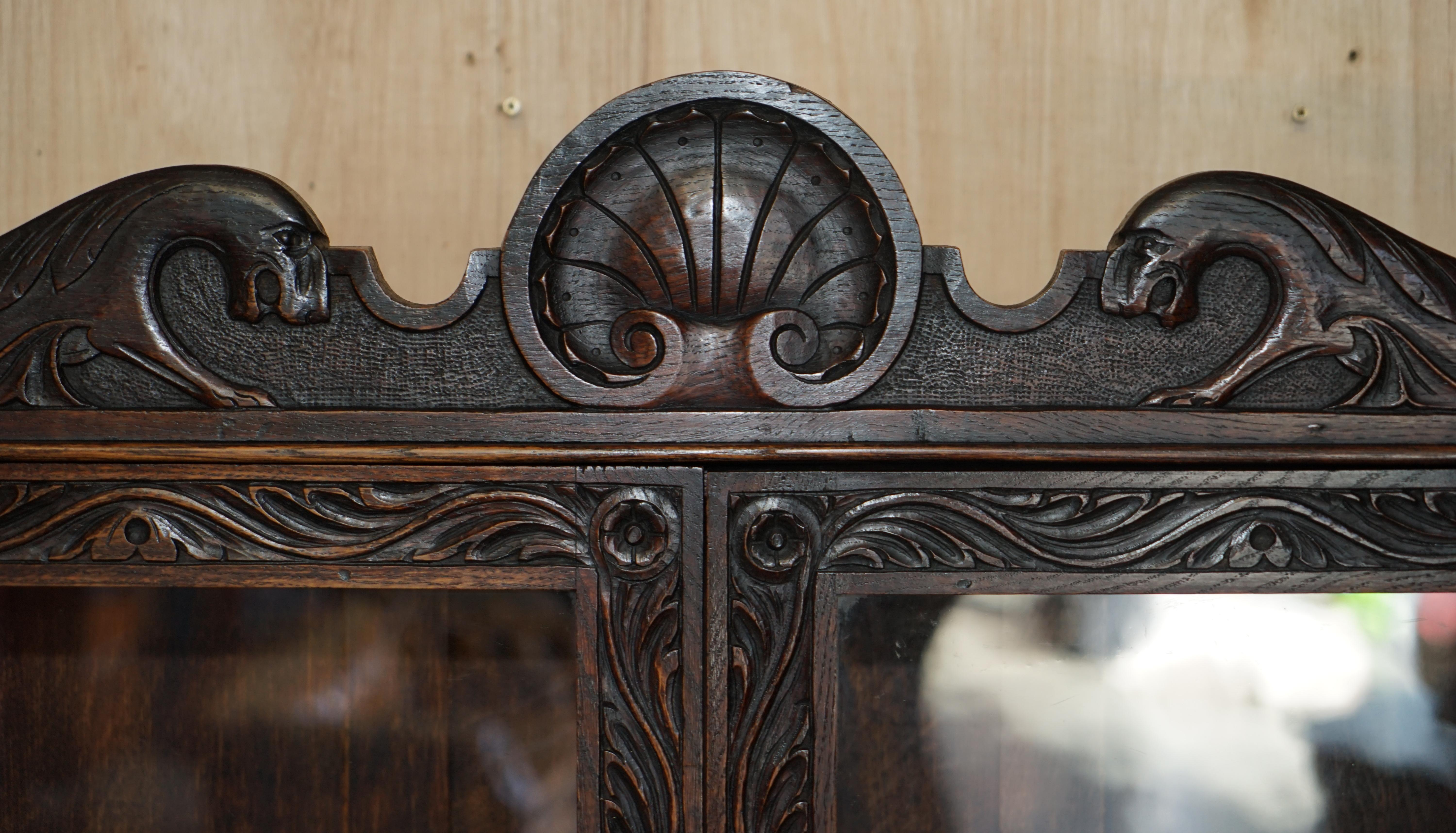 Anglais ORNATELY CARVED ENGLISH OAK LIBRARY BUREAU BOOKCASE LION'S HEAD BRASS HANDLES en vente